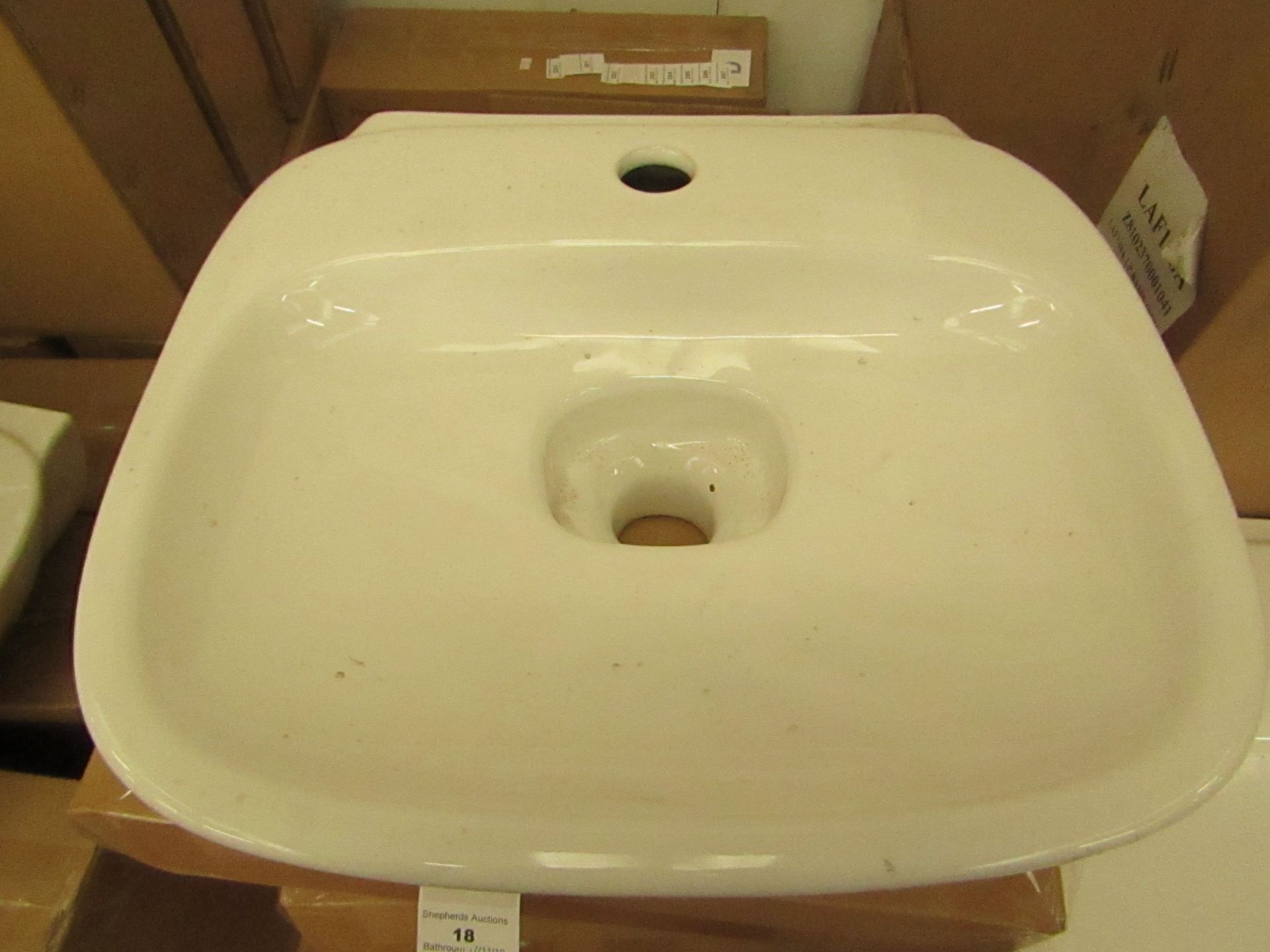 Laufen made 400mm 1 tap Hole sink with porcelain drain cover, new and boxed.