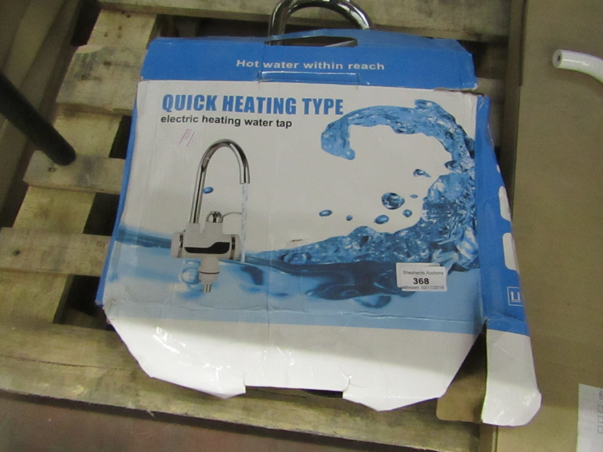 Quick heating type electric heating water tap, boxed.