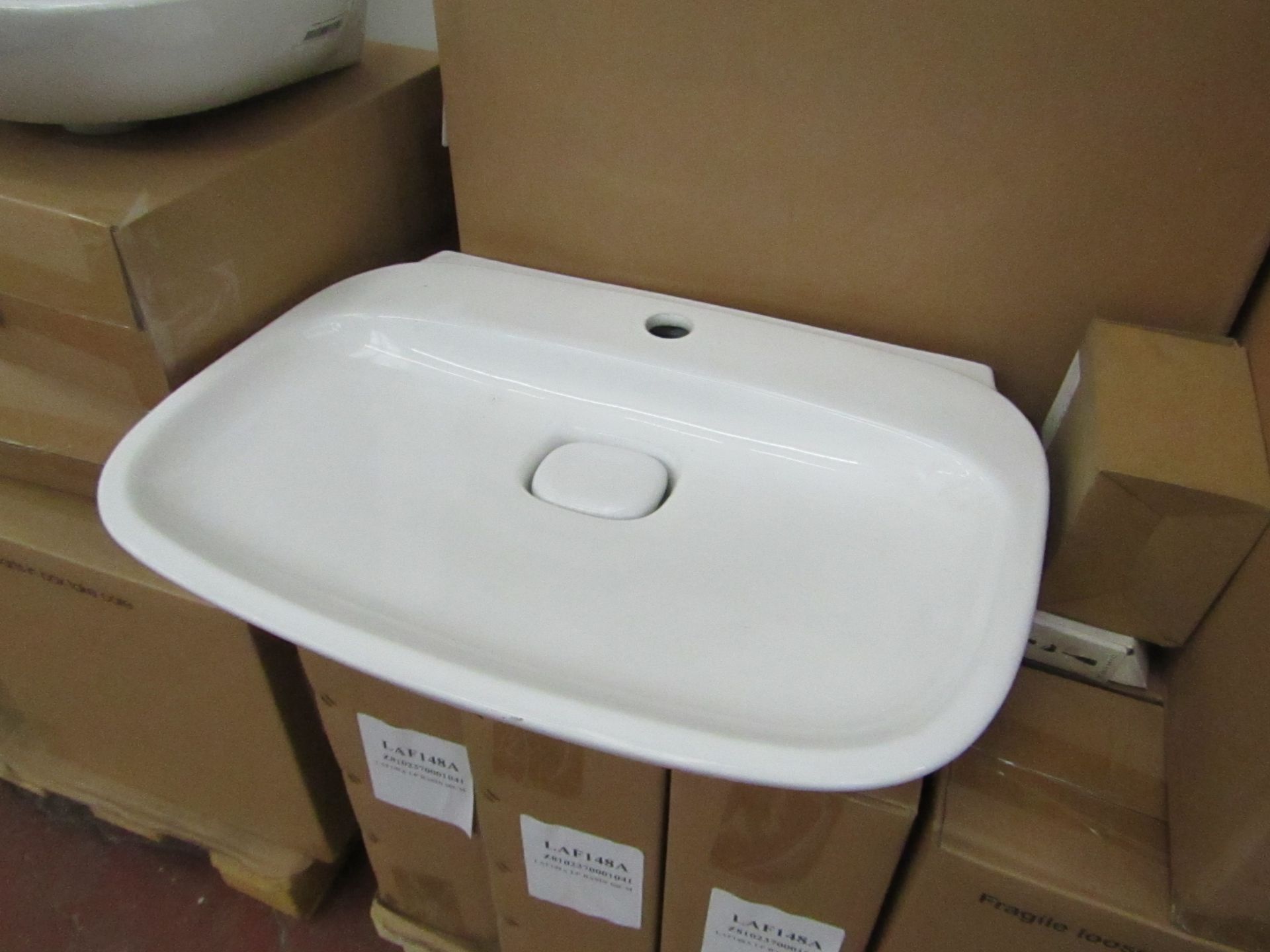 Laufen made 500mm 1 tap Hole sink with porcelain drain cover and matching full pedestal, both new