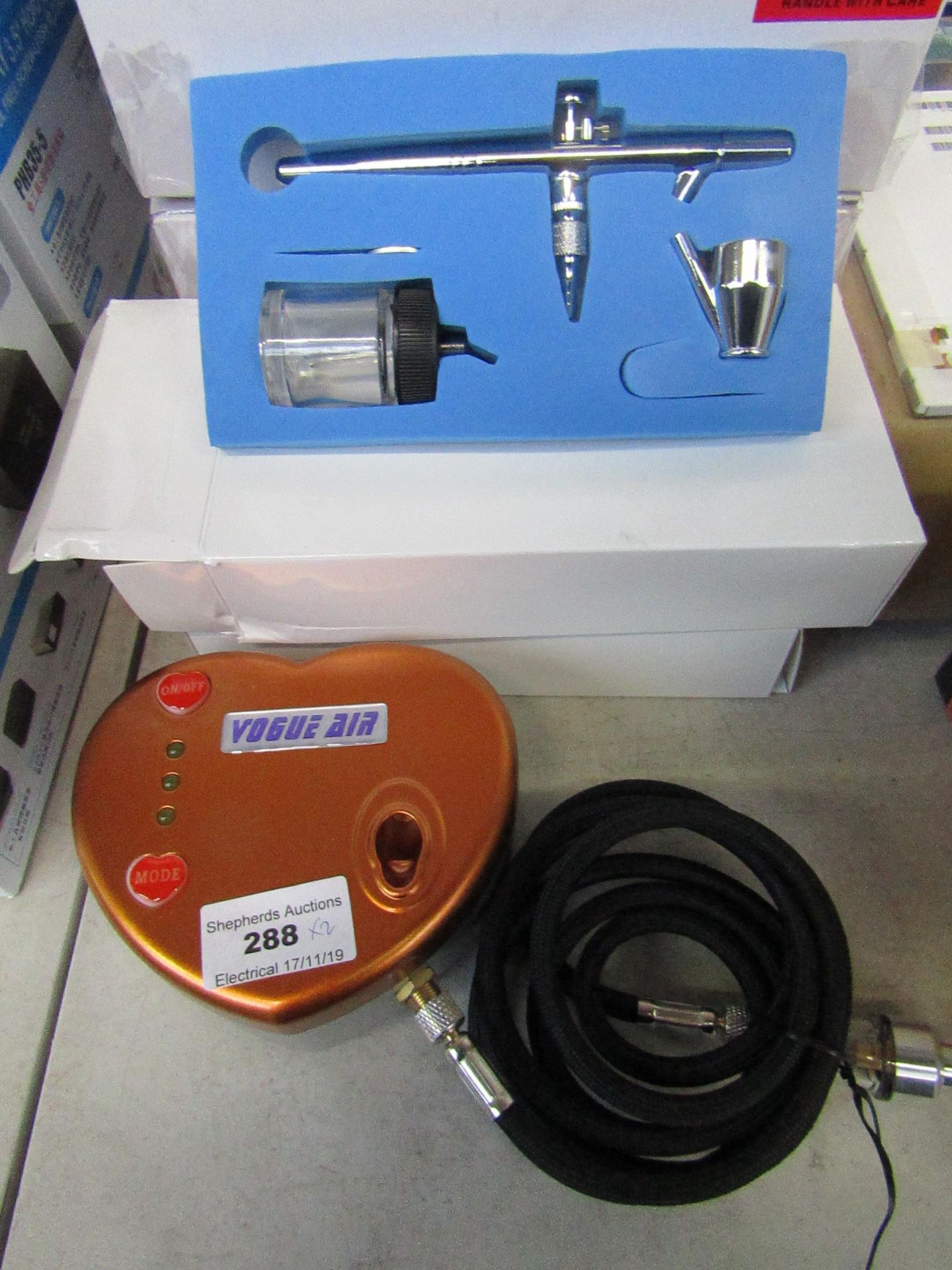 HS08-2 series battery mini air compressor, includes Air Brush, looks unused and boxed.