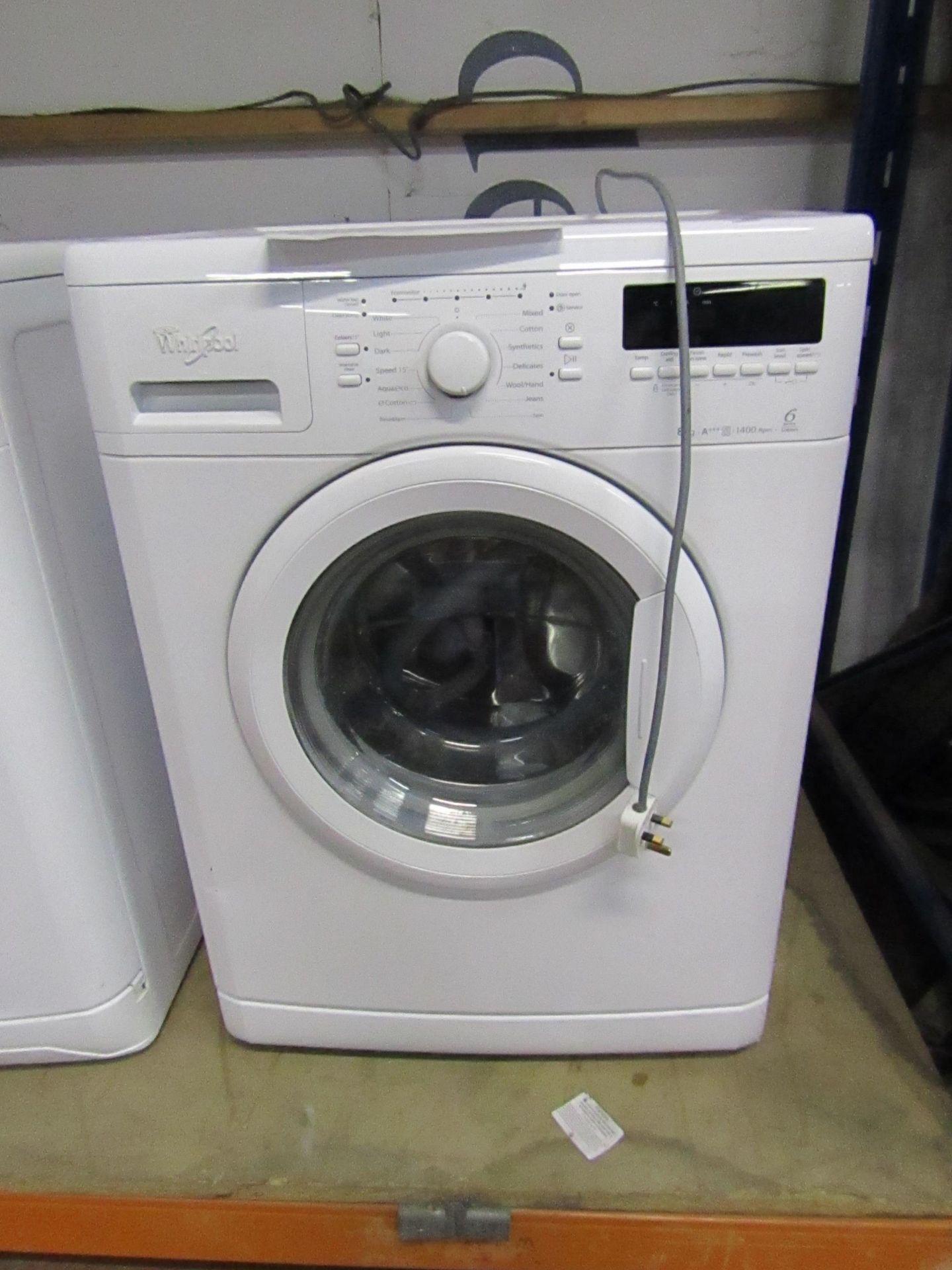 Whirlpool 6th Sense Colours 8Kg washing machine, powers on but appears to have transport bolts in so