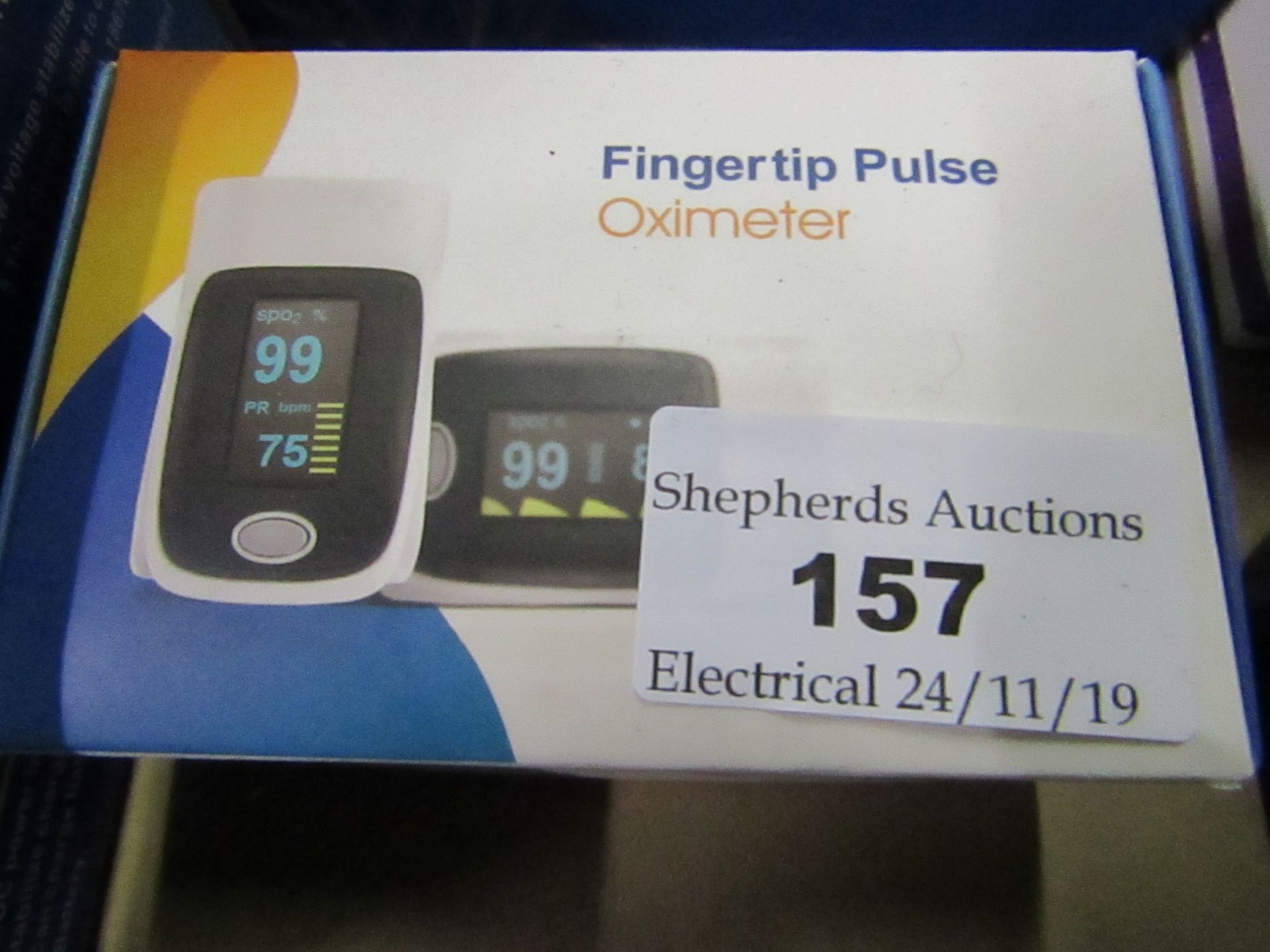 Fingertip pulse Oximeter, unchecked and boxed.