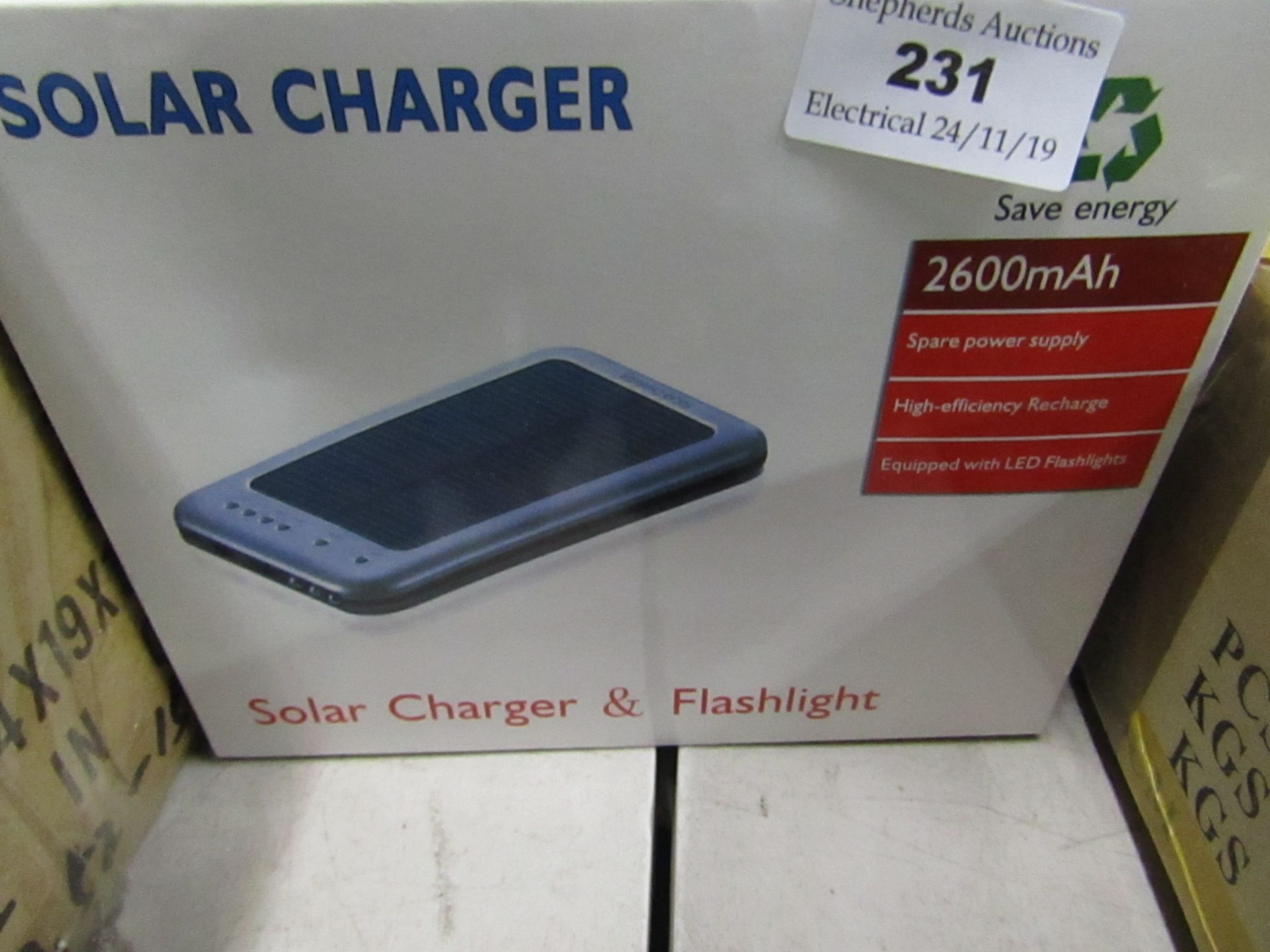 Solar charger & flashlight 2600mAh, untested and boxed.