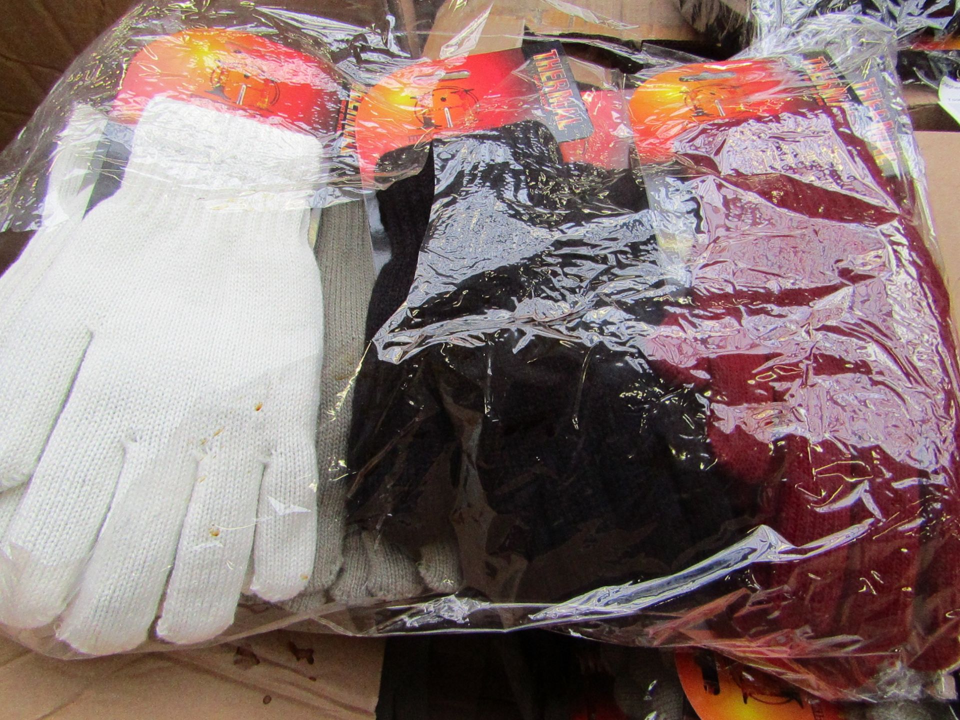 Pack of 12x Thermal Heat gloves, new, the pack contains 4 different colours.