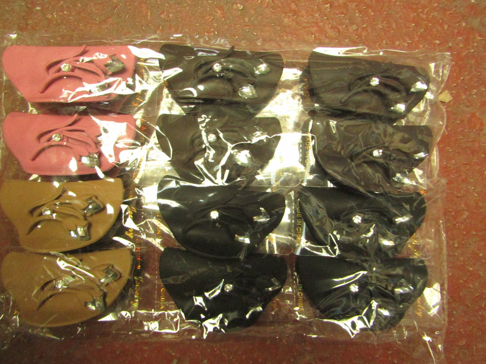 Pack of 12 Textured Hair Clips. New & packaged.