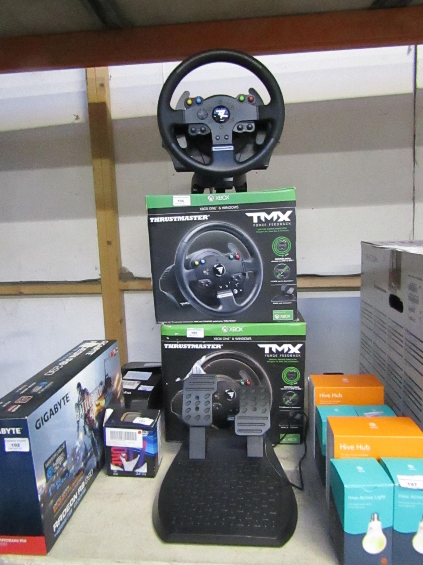 Thrustmaster TMX Pro steering wheel and pedals set, untested and boxed. RRP Circa £220.00