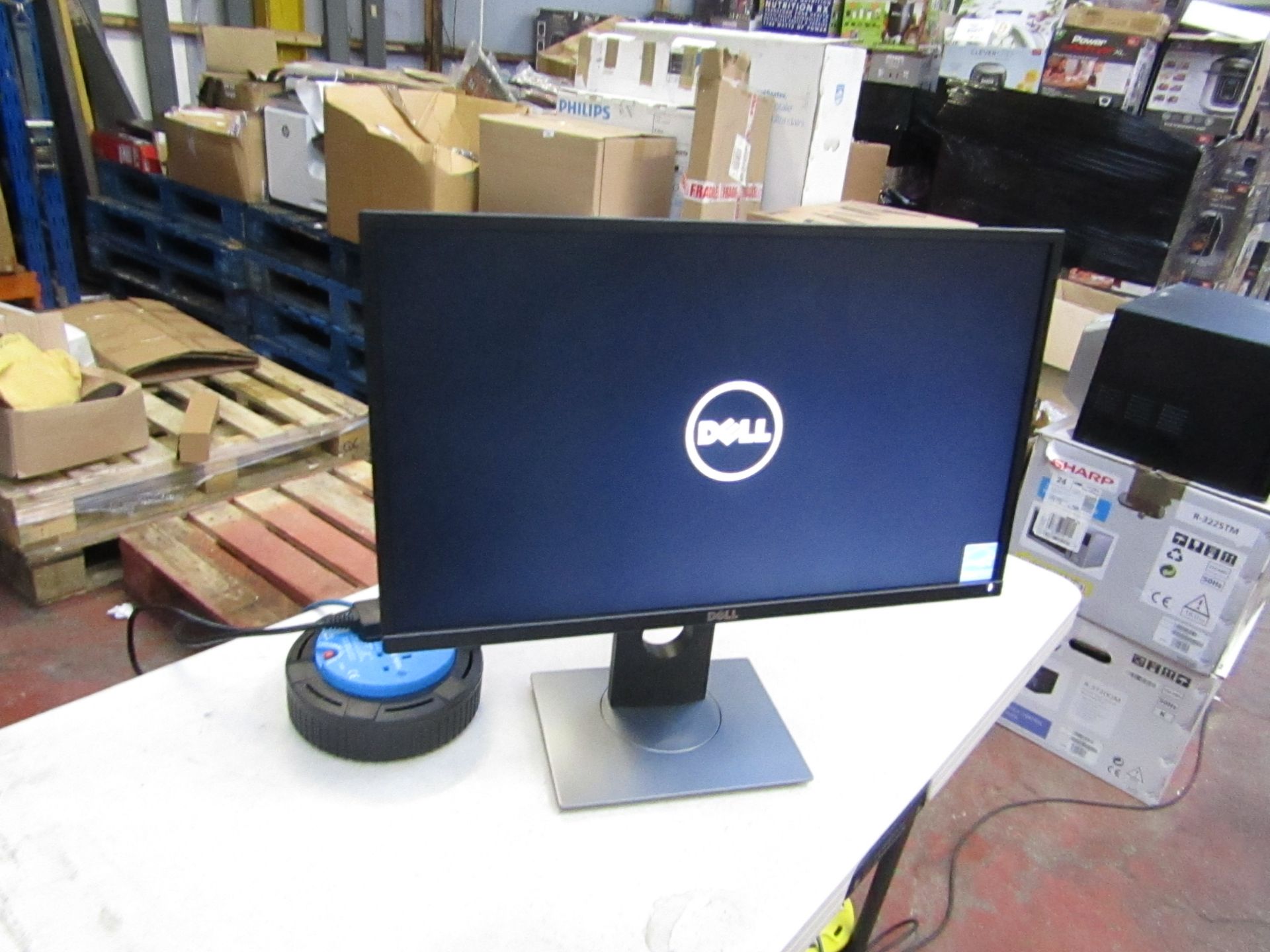 Dell 24" flat panel monitor, tested working but has line on the screen.