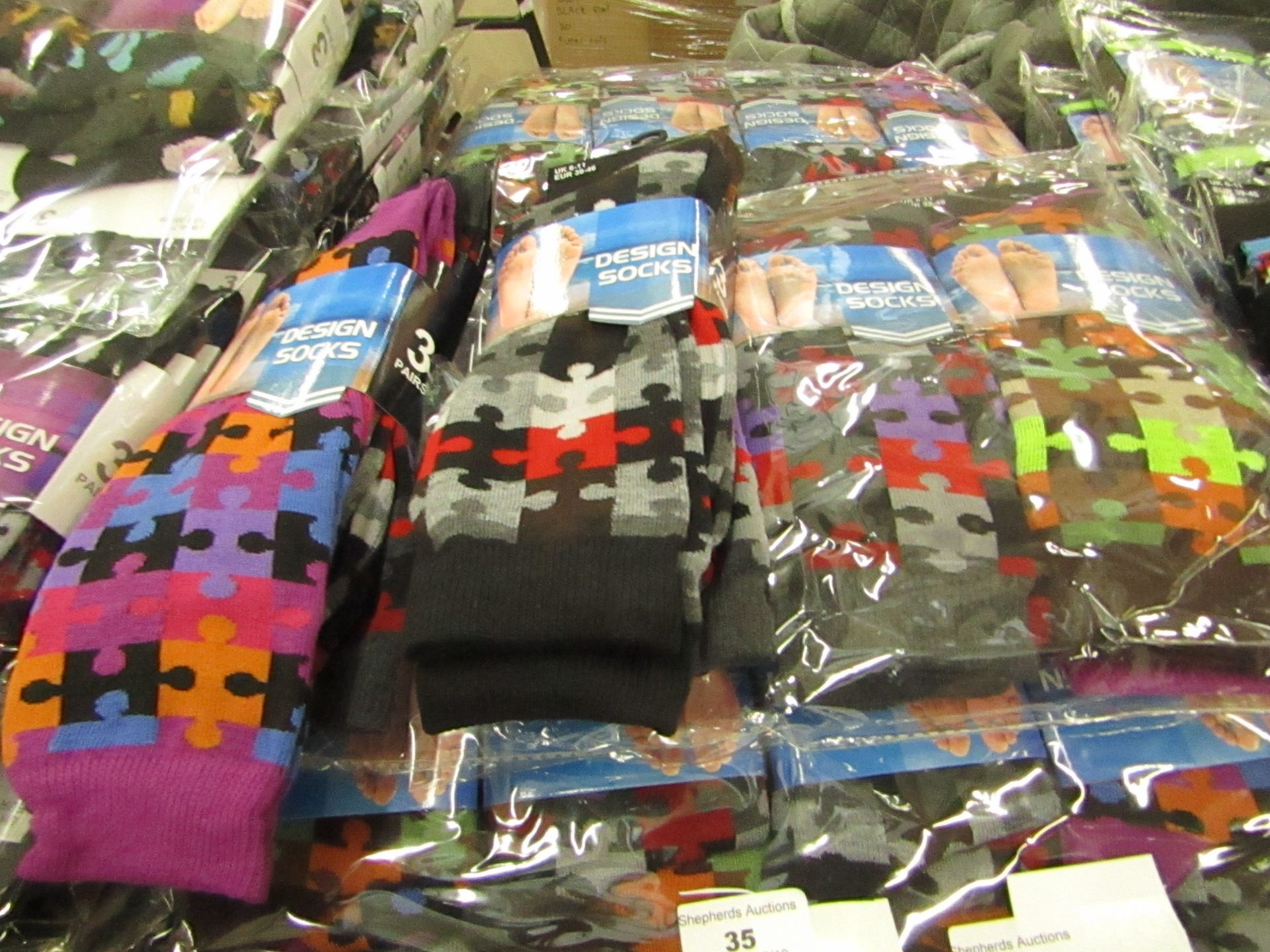 Pack of 12 pairs Mens Design Patterned Socks size 6-11 all new in packaging