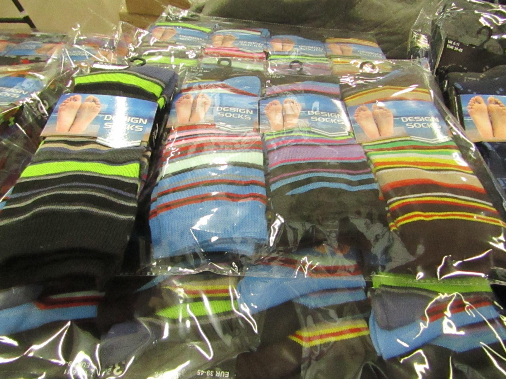 Pack of 12 pairs Mens Design Patterned Socks size 6-11 all new in packaging