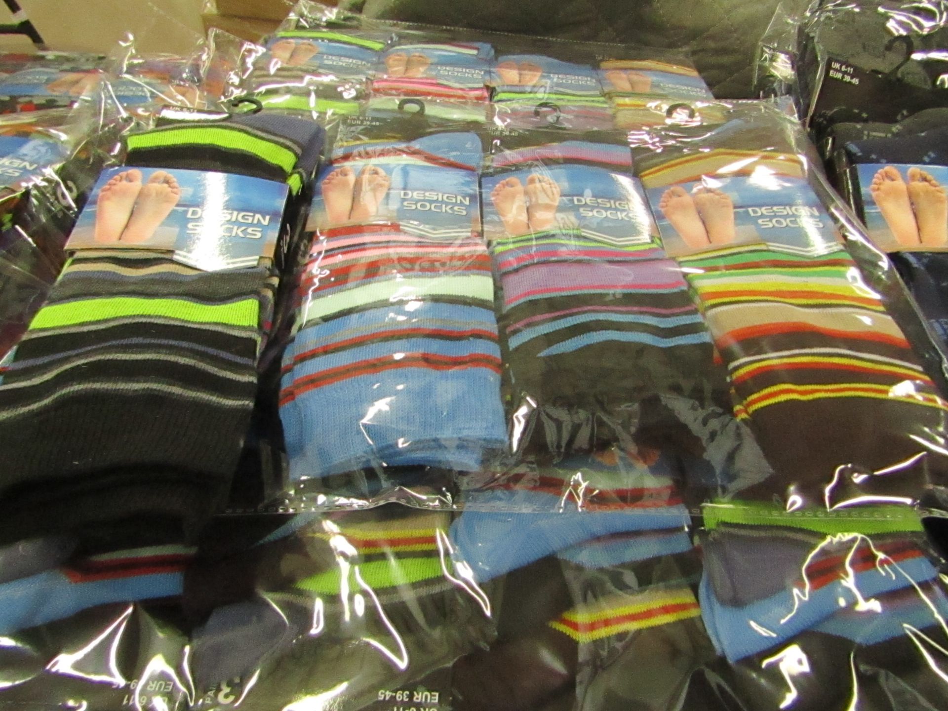 Pack of 12 pairs Mens Design Patterned Socks size 6-11 all new in packaging