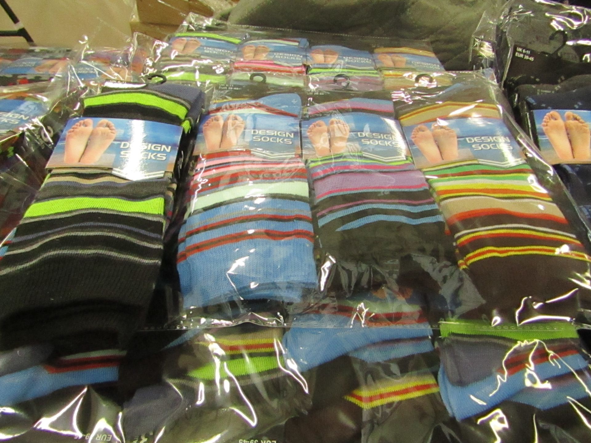 Pack of 12 pairs Mens Design Patterned Socks size 6-11 all new in packaging