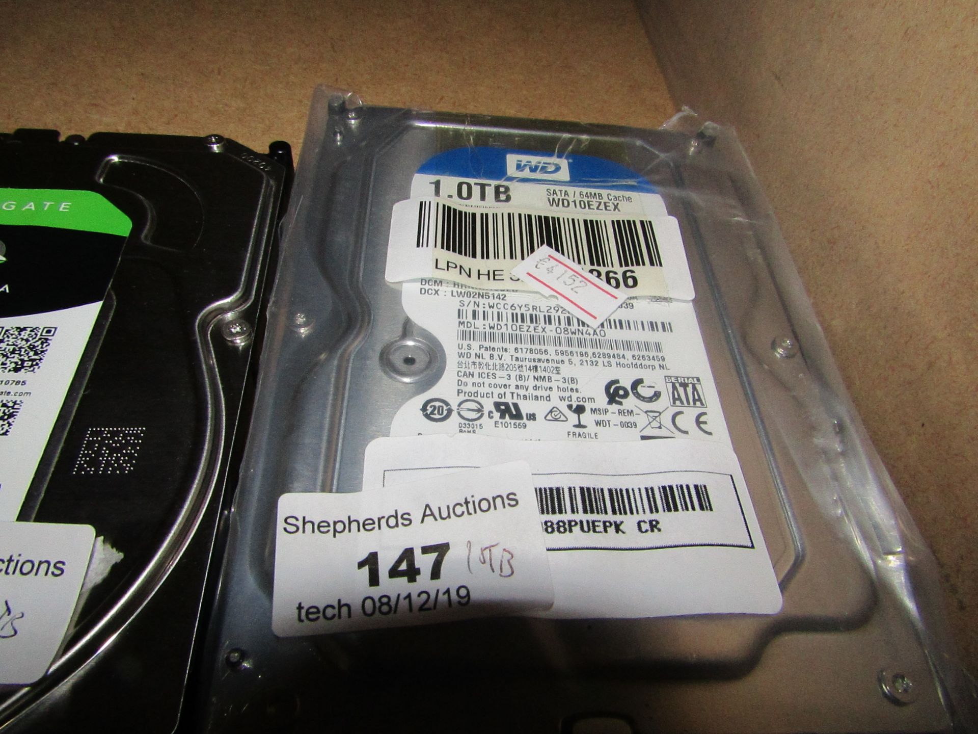 Western Digital 1TB hard drive, untested.