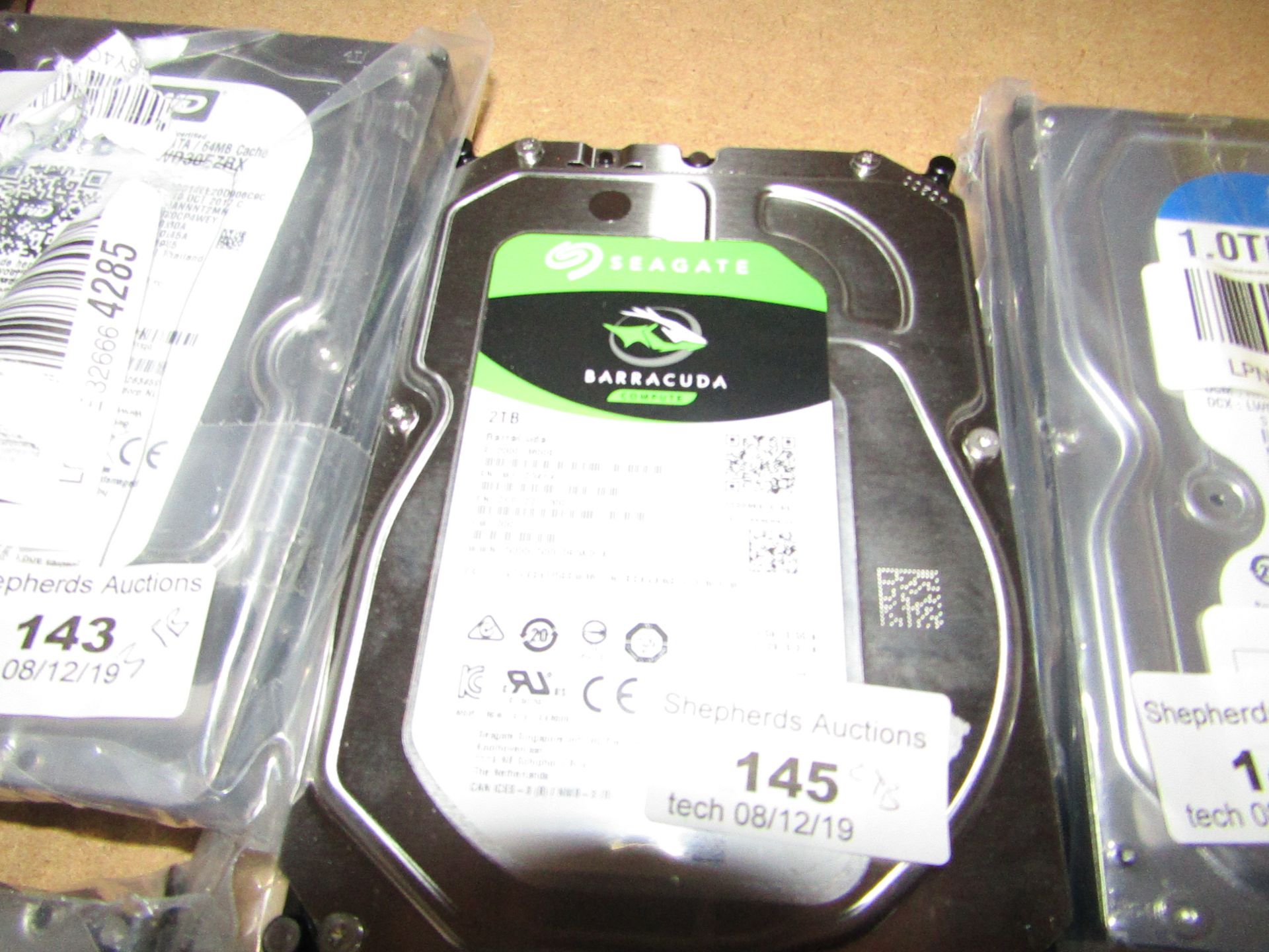 Seagate 2TB hard drive, untested.