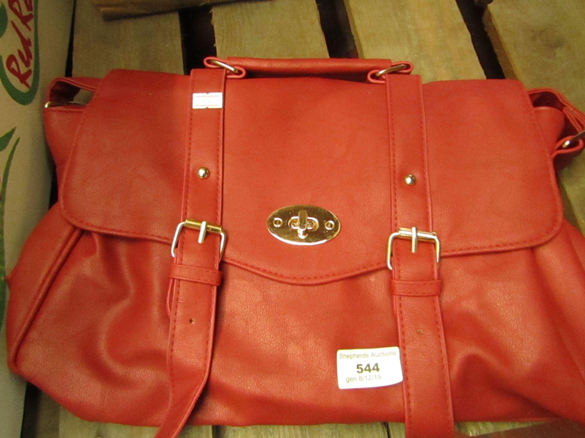 Ladies Red handbag. Looks unused