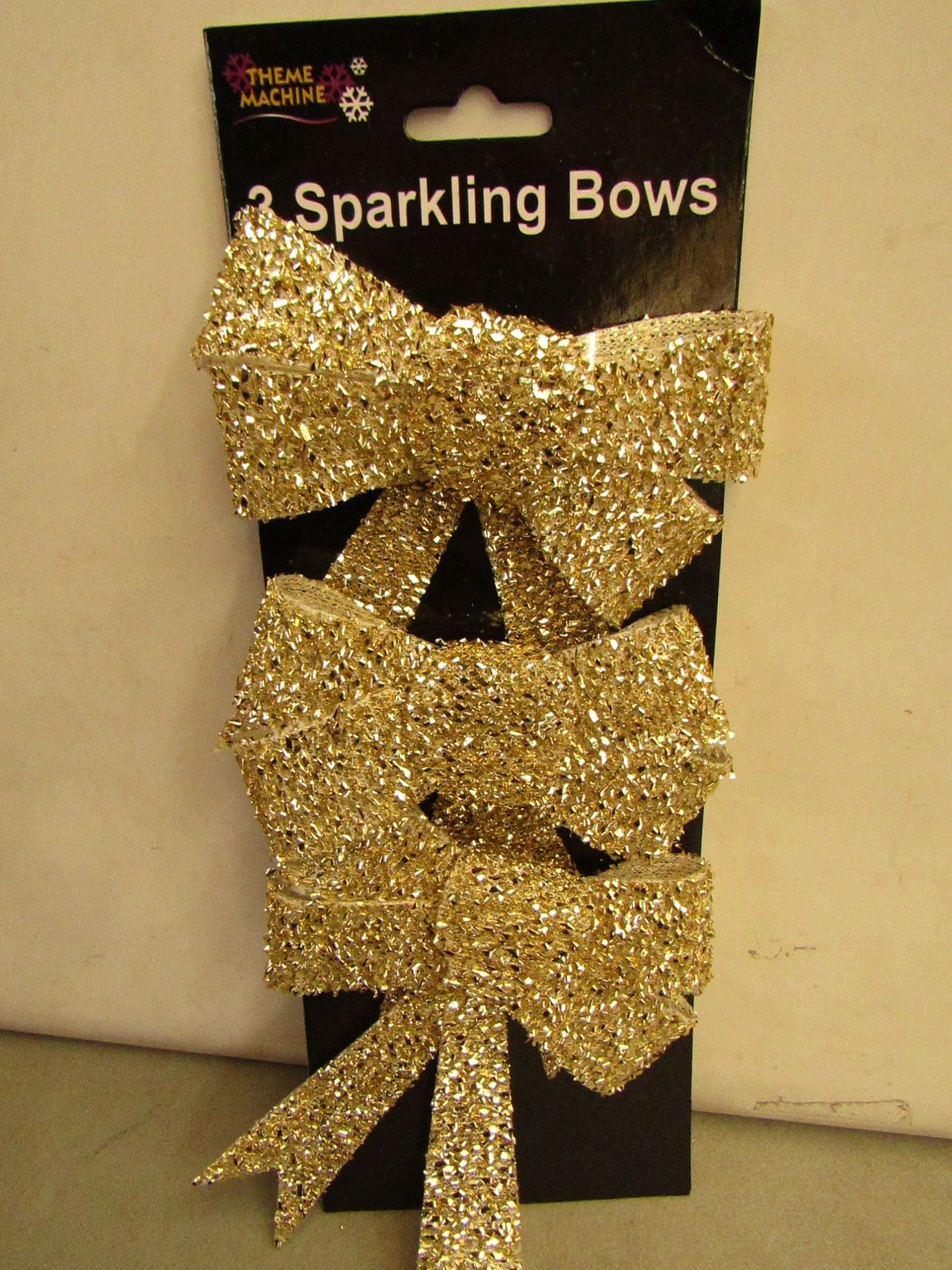 24 Packs of 3 Gold Sparkling Bows. Ideal for Xmas Trees. New & packaged