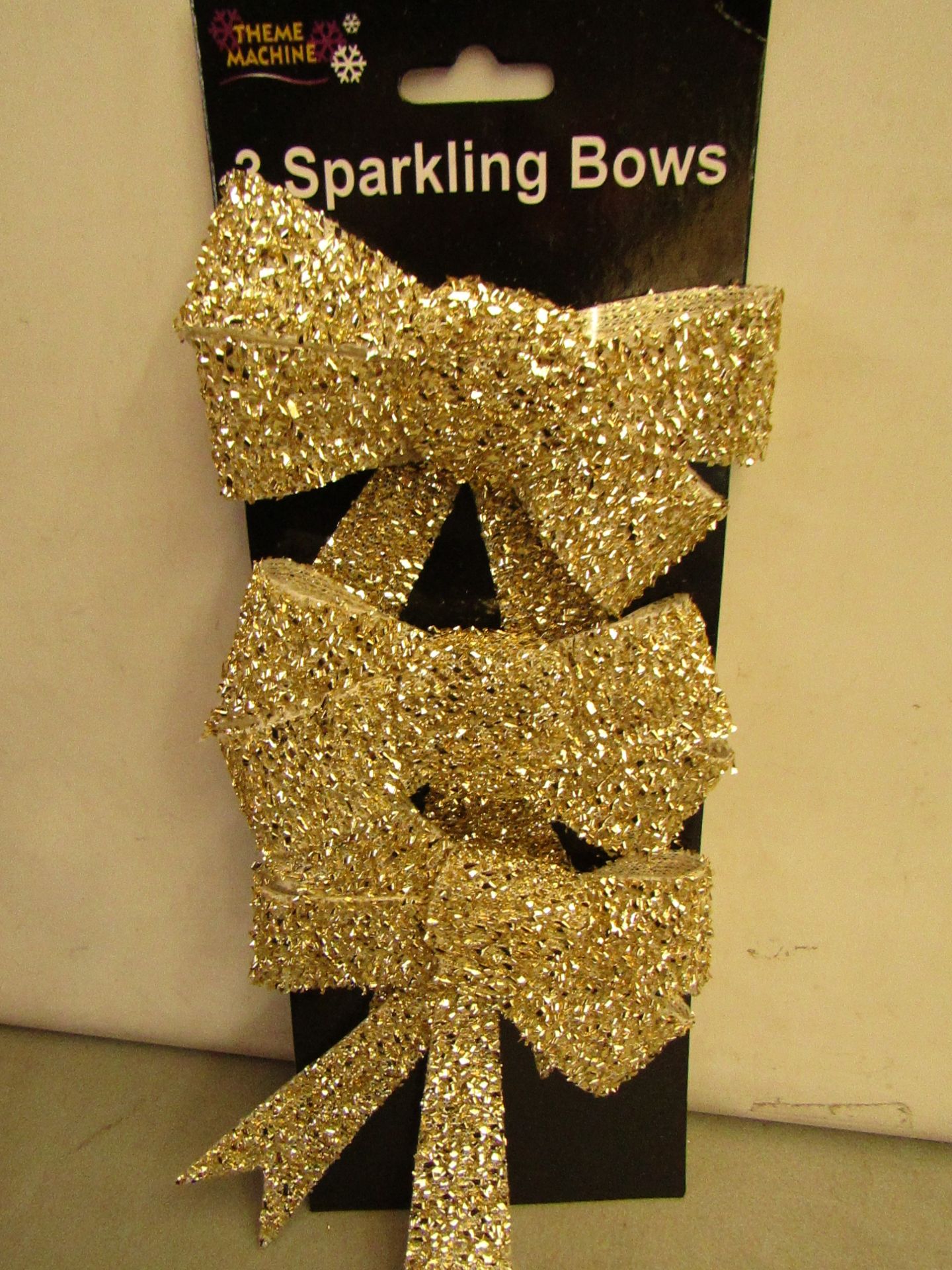 24 Packs of 3 Gold Sparkling Bows. Ideal for Xmas Trees. New & packaged