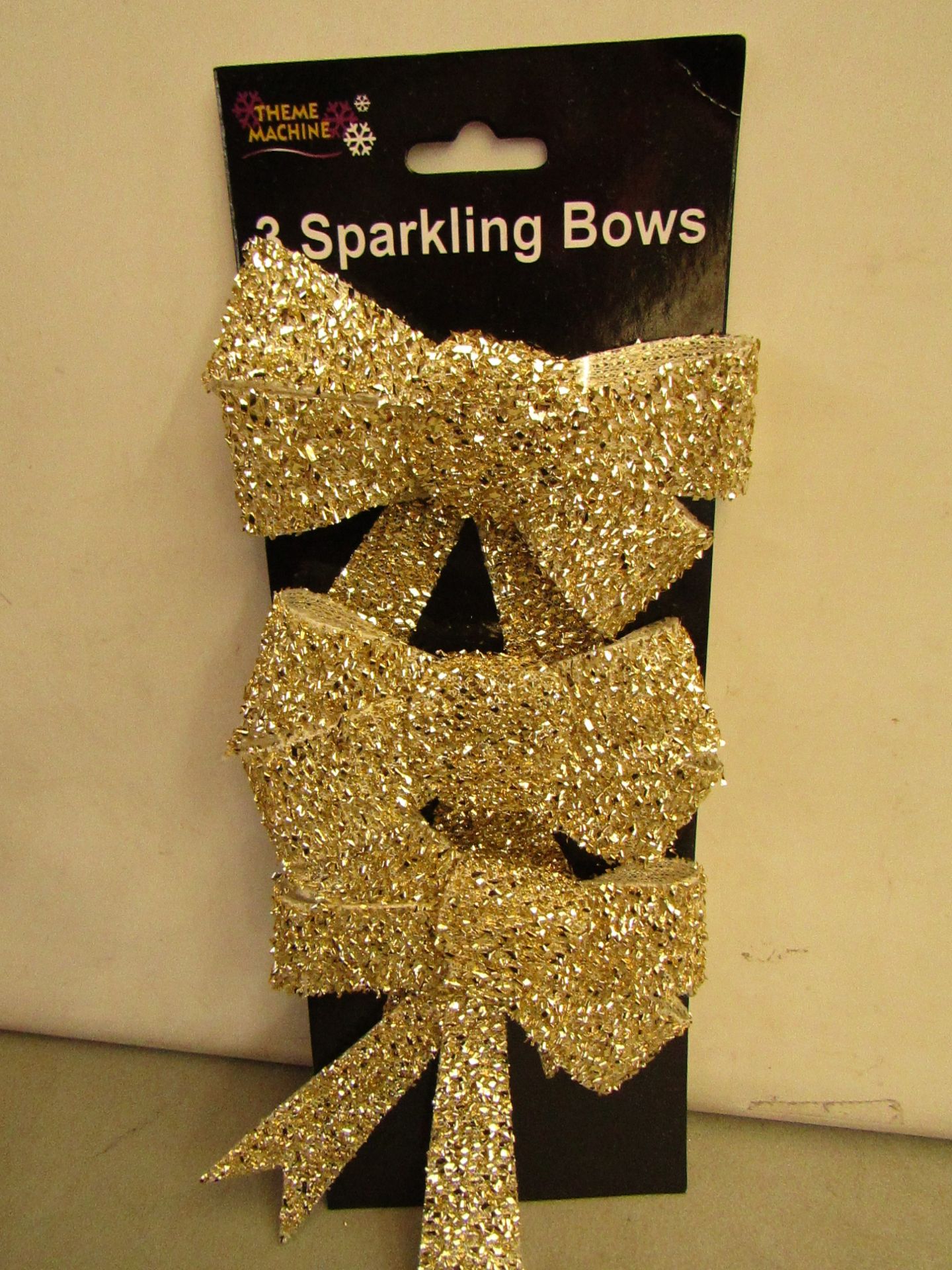 24 Packs of 3 Gold Sparkling Bows. Ideal for Xmas Trees. New & packaged