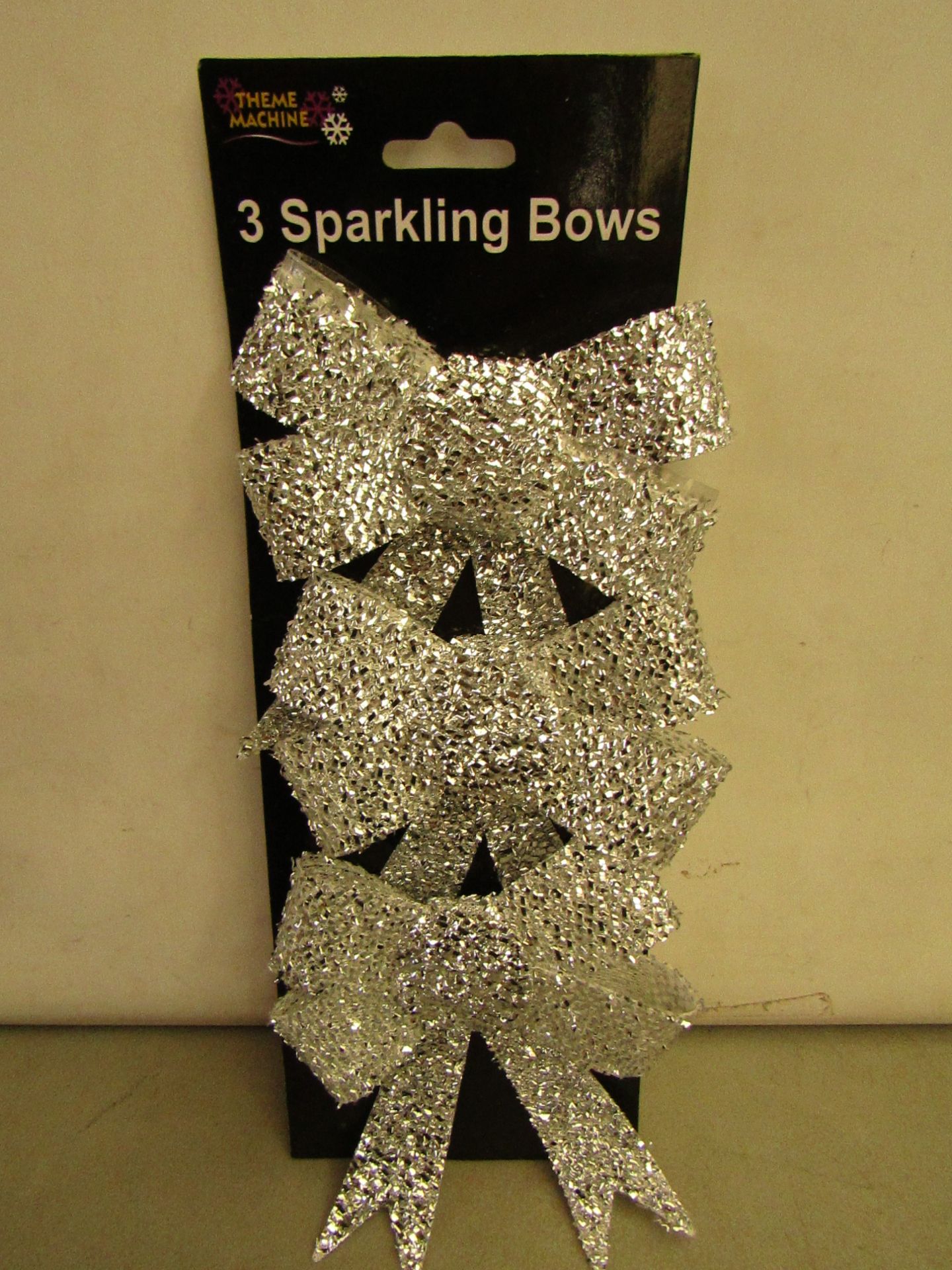 24 Packs of 3 Silver Sparkling Bows. Ideal for Xmas Trees. New & packaged