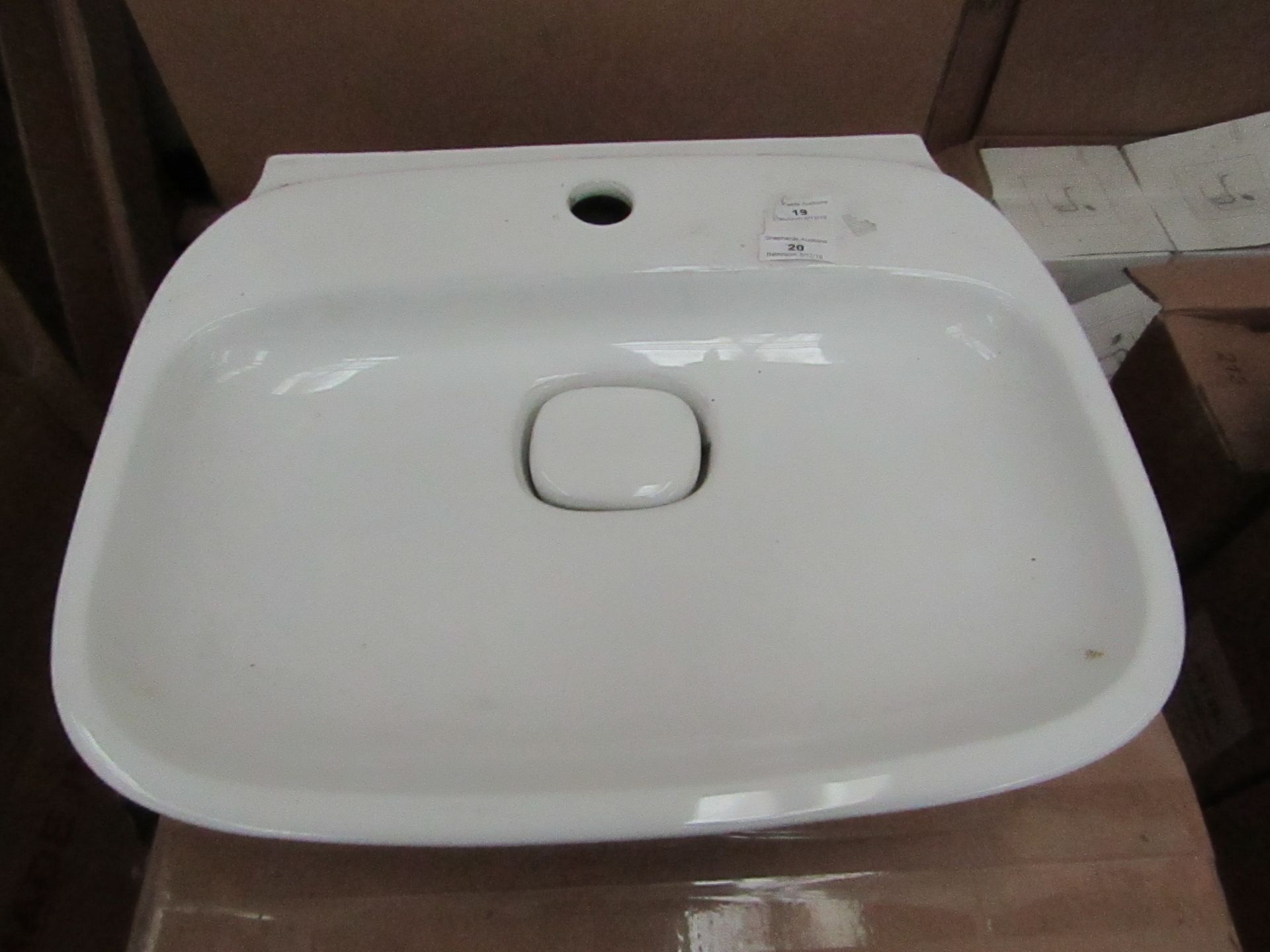 Laufen made 500mm 1 tap Hole sink with porcelain drain cover andf matching full pedestal, new and