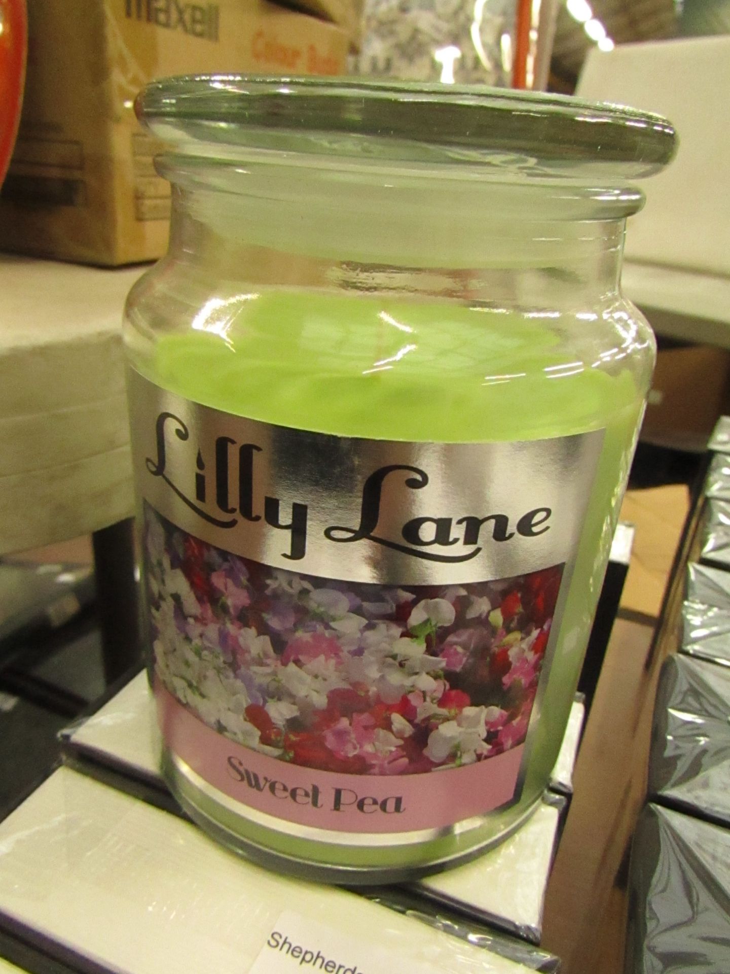 Lilly Lane Sweat pea 18oz Candle in a glass Jar. New & Smells amazing!