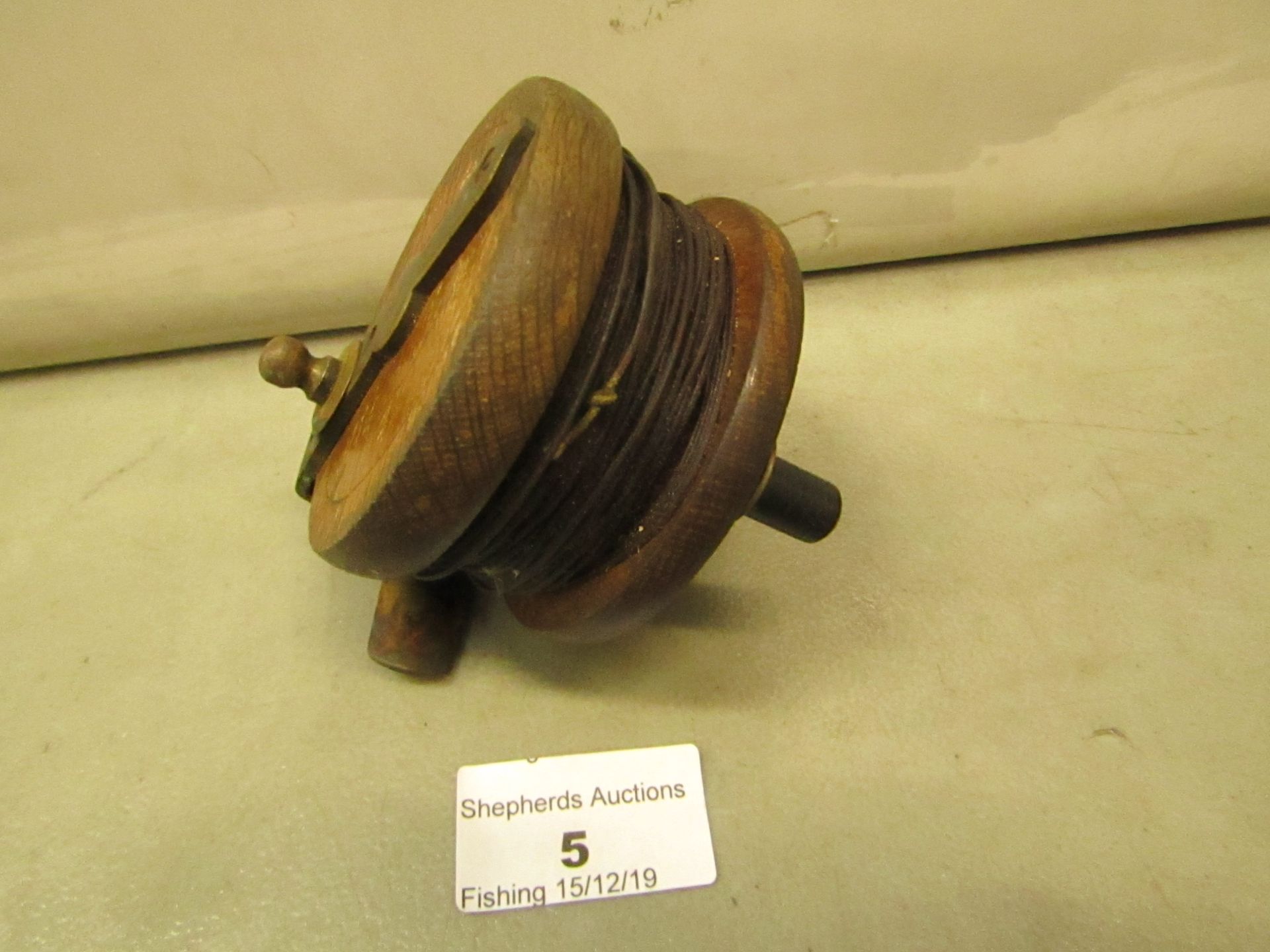 Wooden Fishing Reel Could Have Some Age to it ,turns around ok has got line still on it