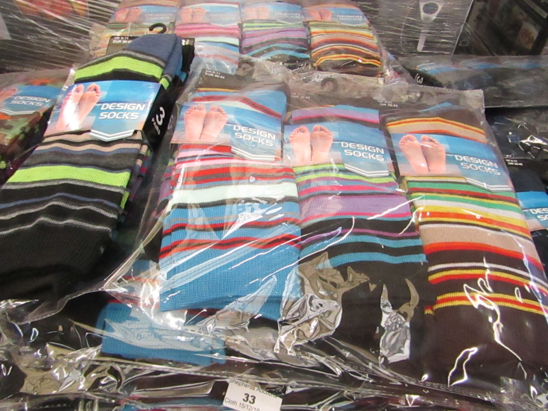 Pack of 12 pairs Mens Design Patterned Socks size 6-11 all new in packaging