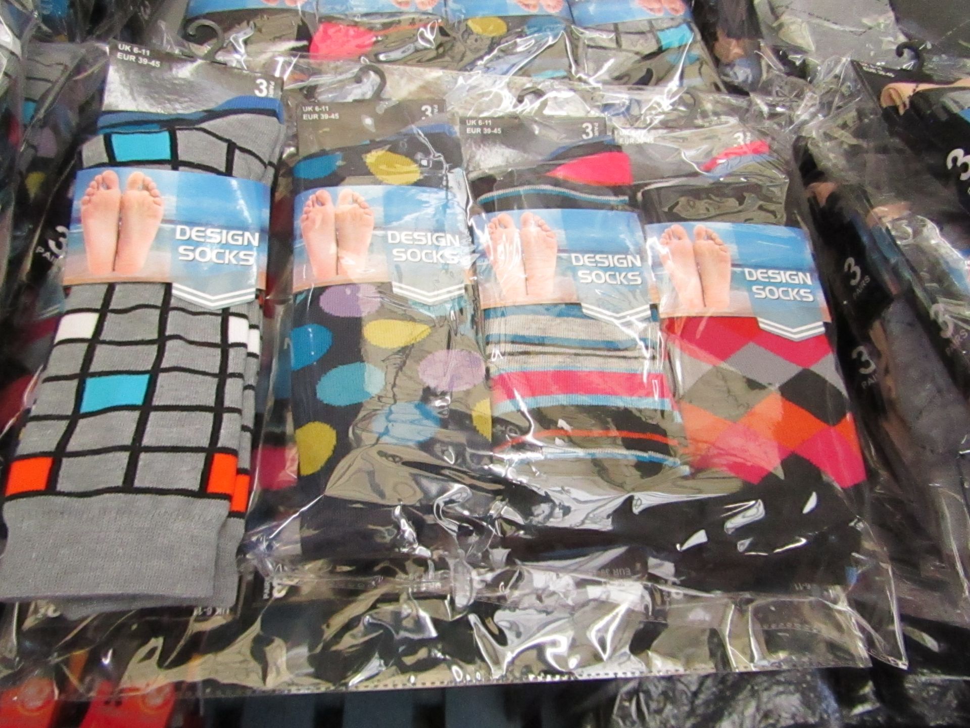 Pack of 12 pairs Mens Design Patterned Socks size 6-11 all new in packaging
