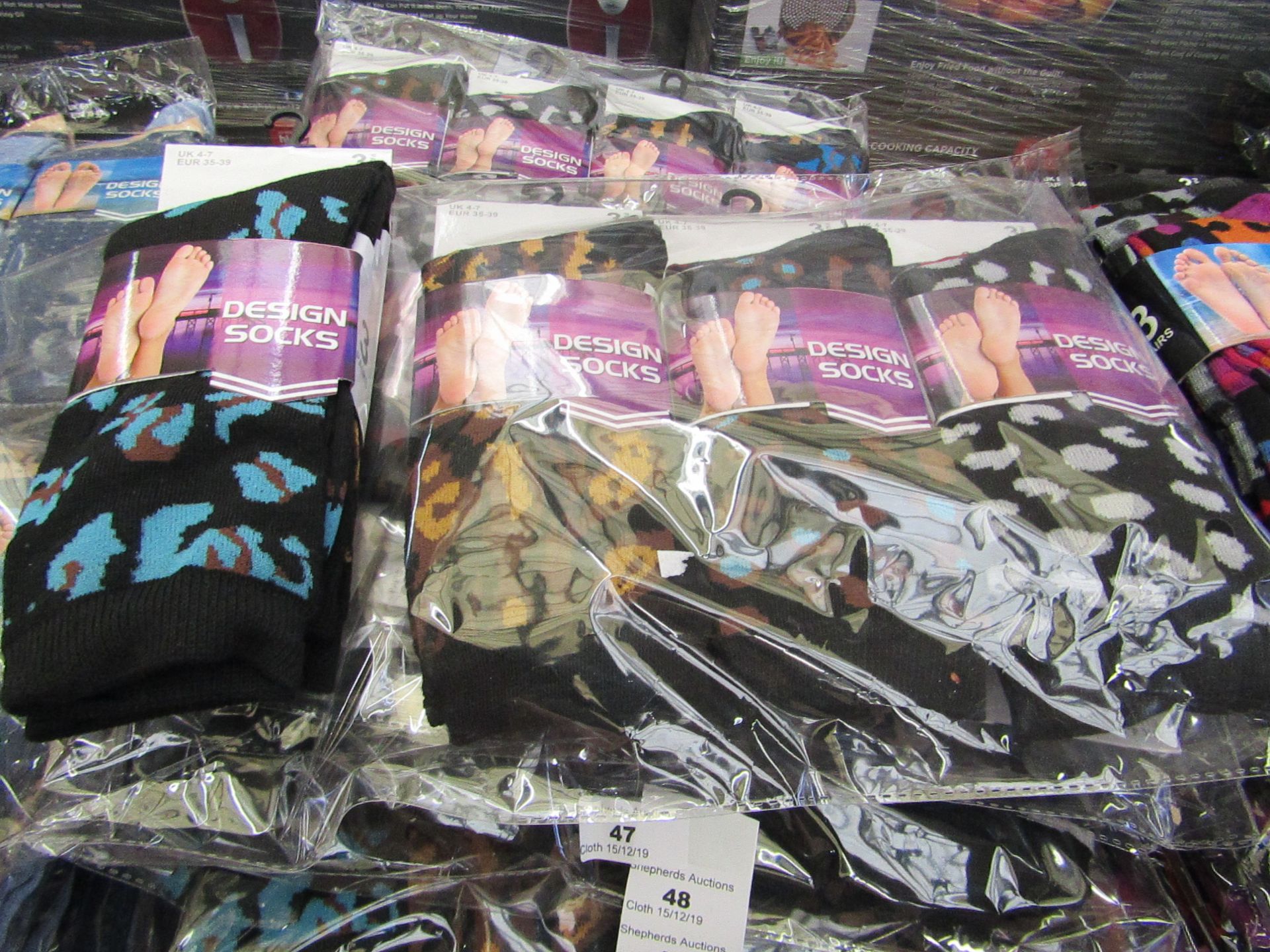 Pack of 12 pairs Mens Design Patterned Socks size 6-11 all new in packaging