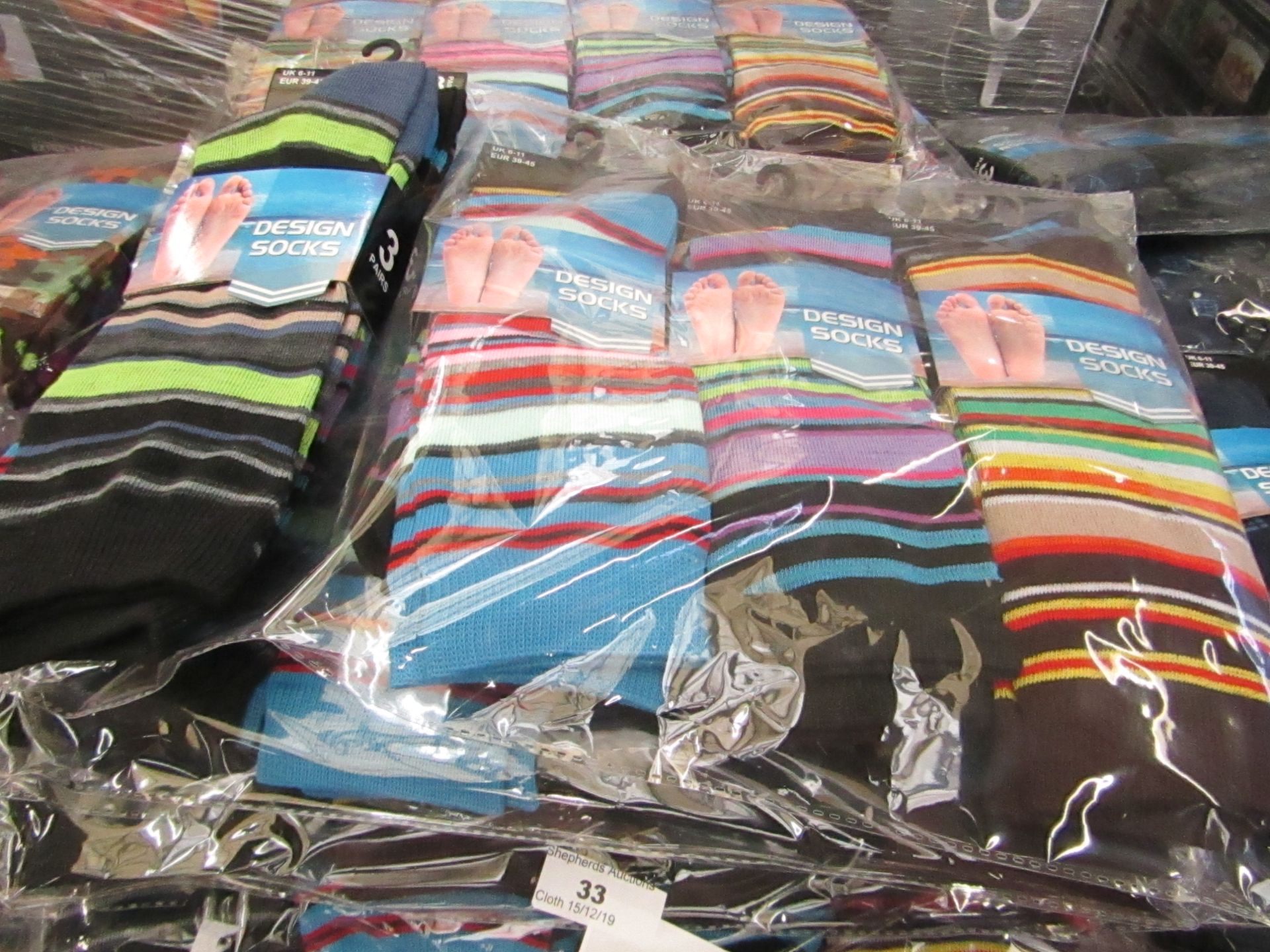 Pack of 12 pairs Mens Design Patterned Socks size 6-11 all new in packaging