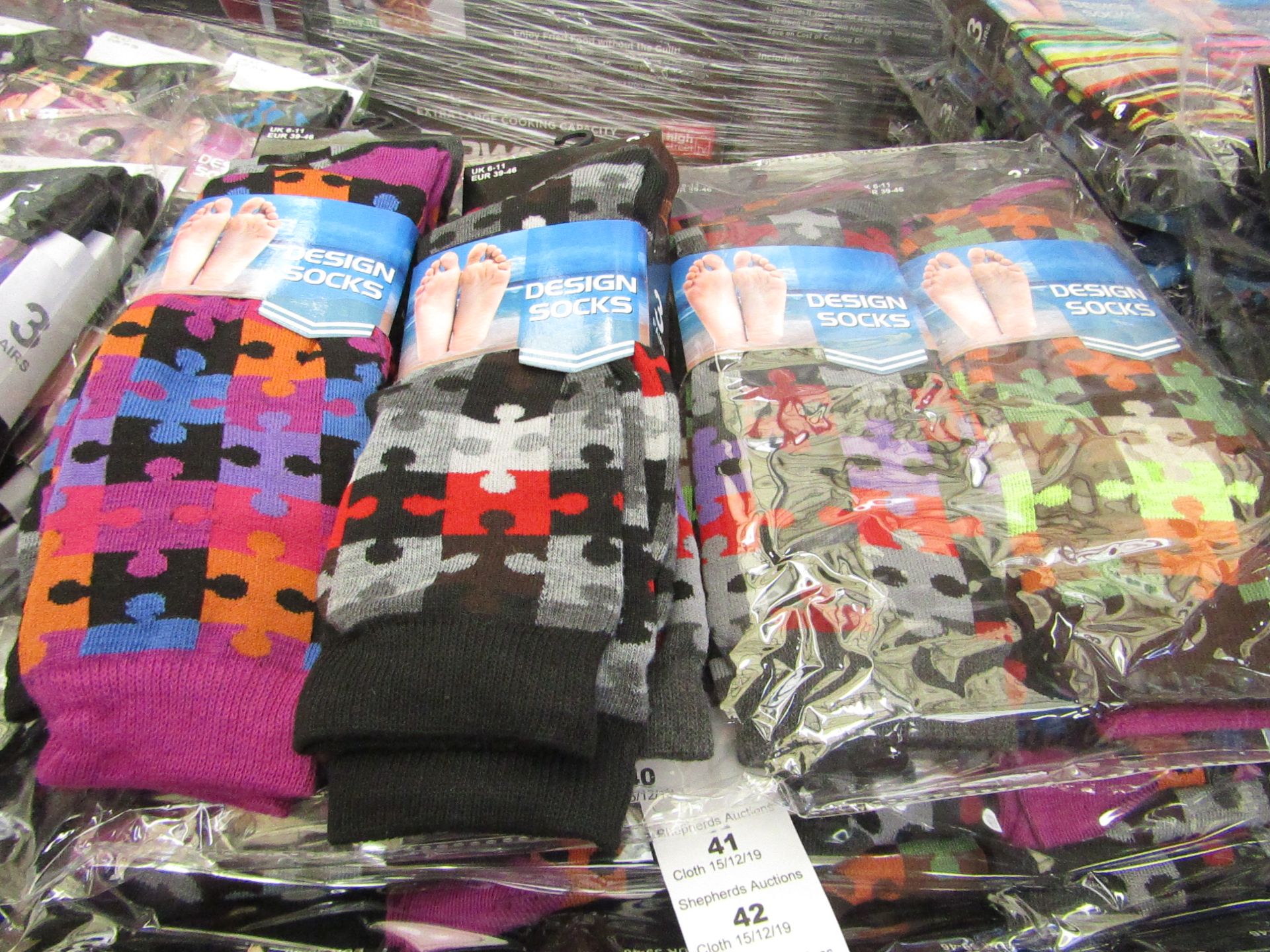 Pack of 12 pairs Mens Design Patterned Socks size 6-11 all new in packaging