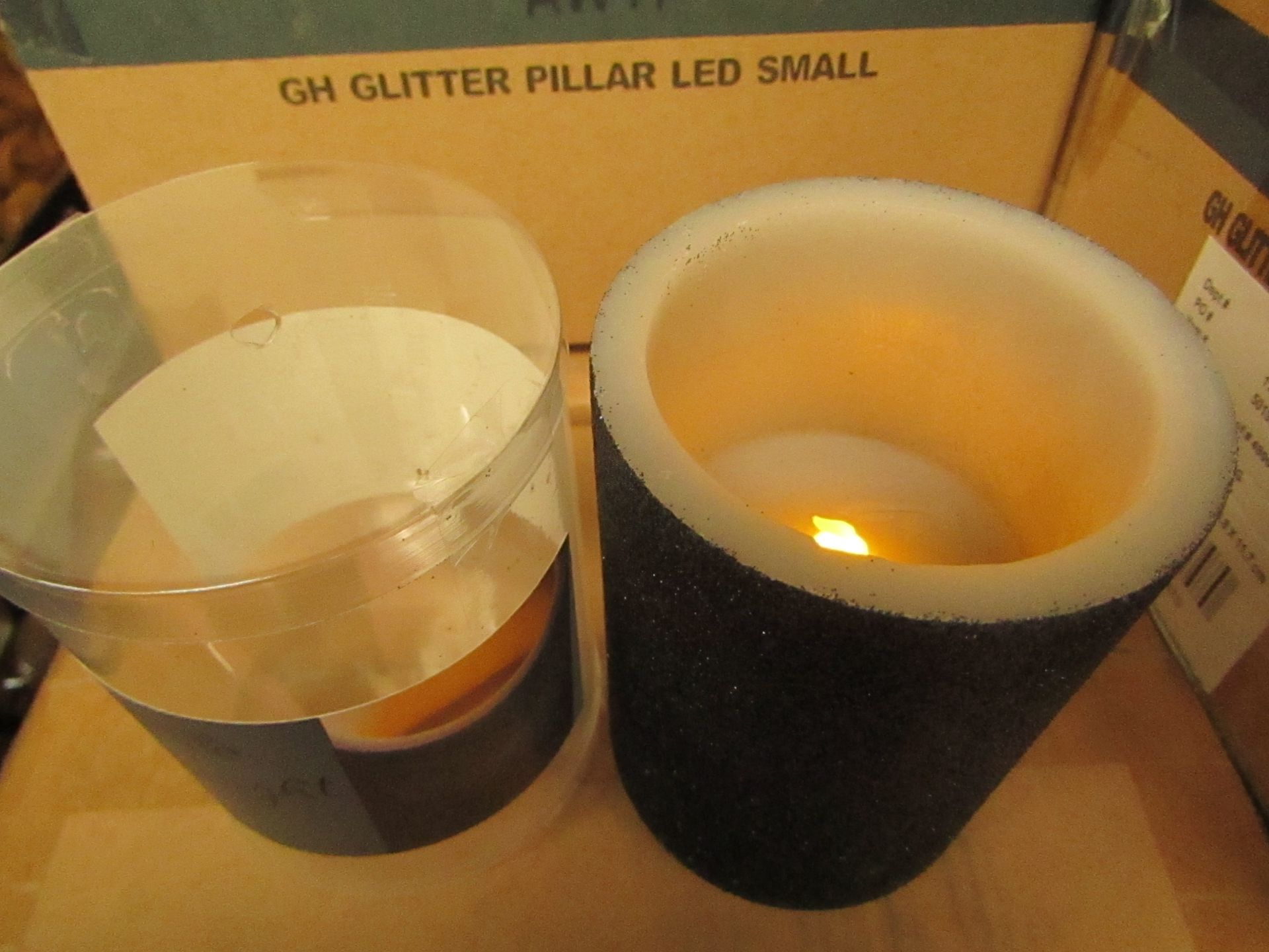 Box of 6 Glitter Pillar LED Candles Scented with Midnight Fig. New & Boxed