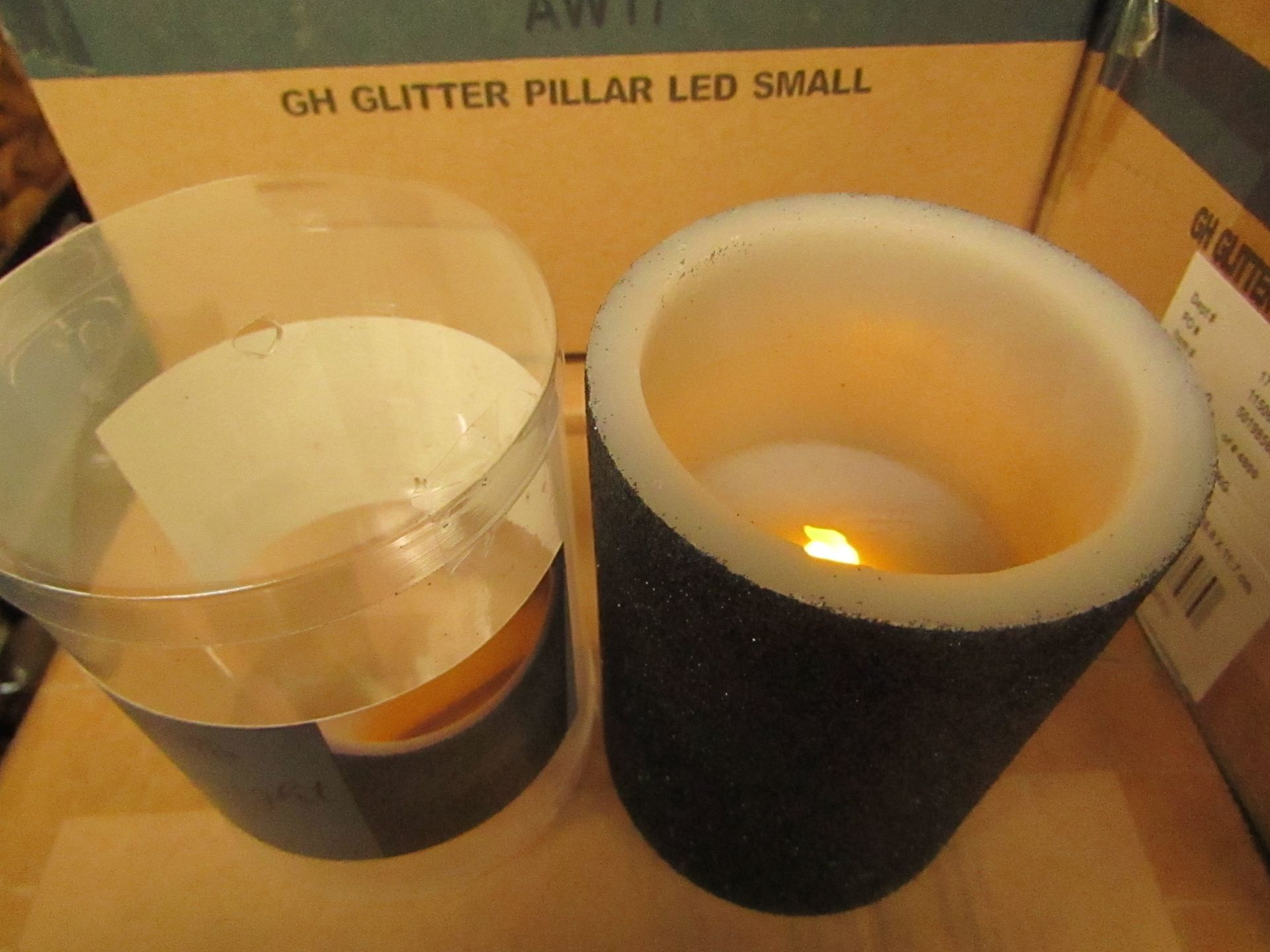 Box of 6 Glitter Pillar LED Candles Scented with Midnight Fig. New & Boxed