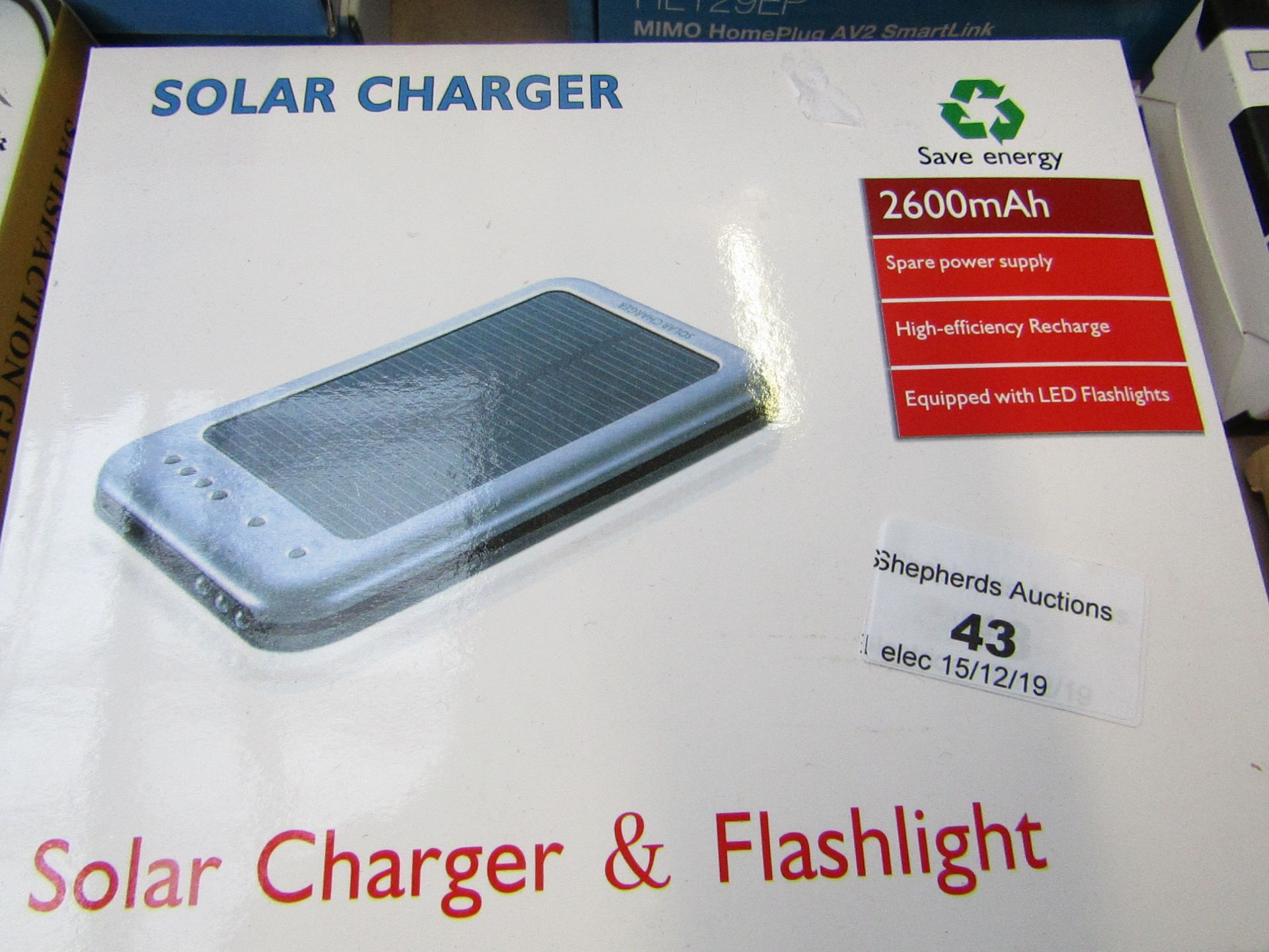 Solar charger & flashlight 2600mAh, untested and boxed.