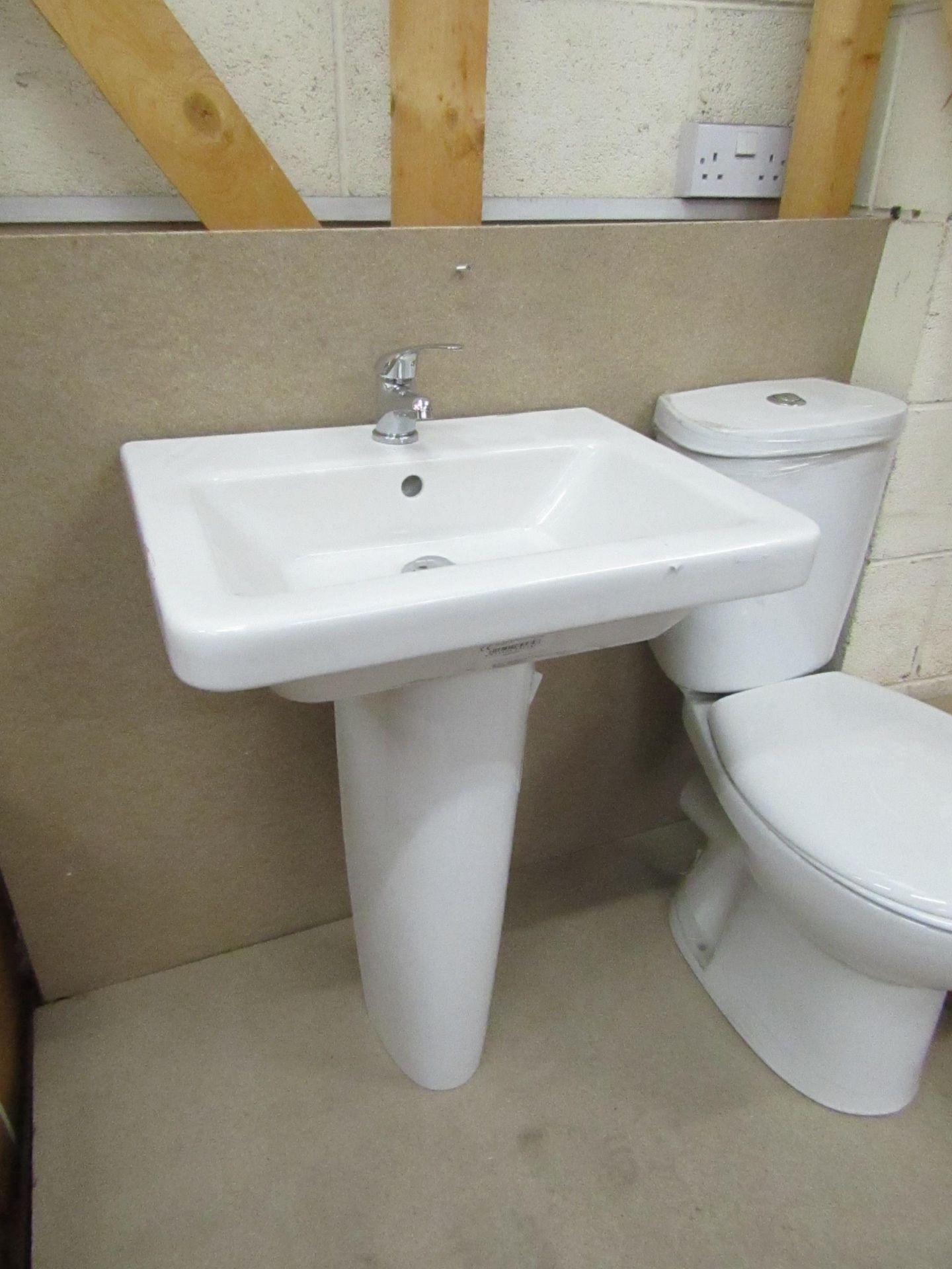 Verso Cloakroom basin set that includes a 550mm sink with full pedestal and a Mono Block Sink tap