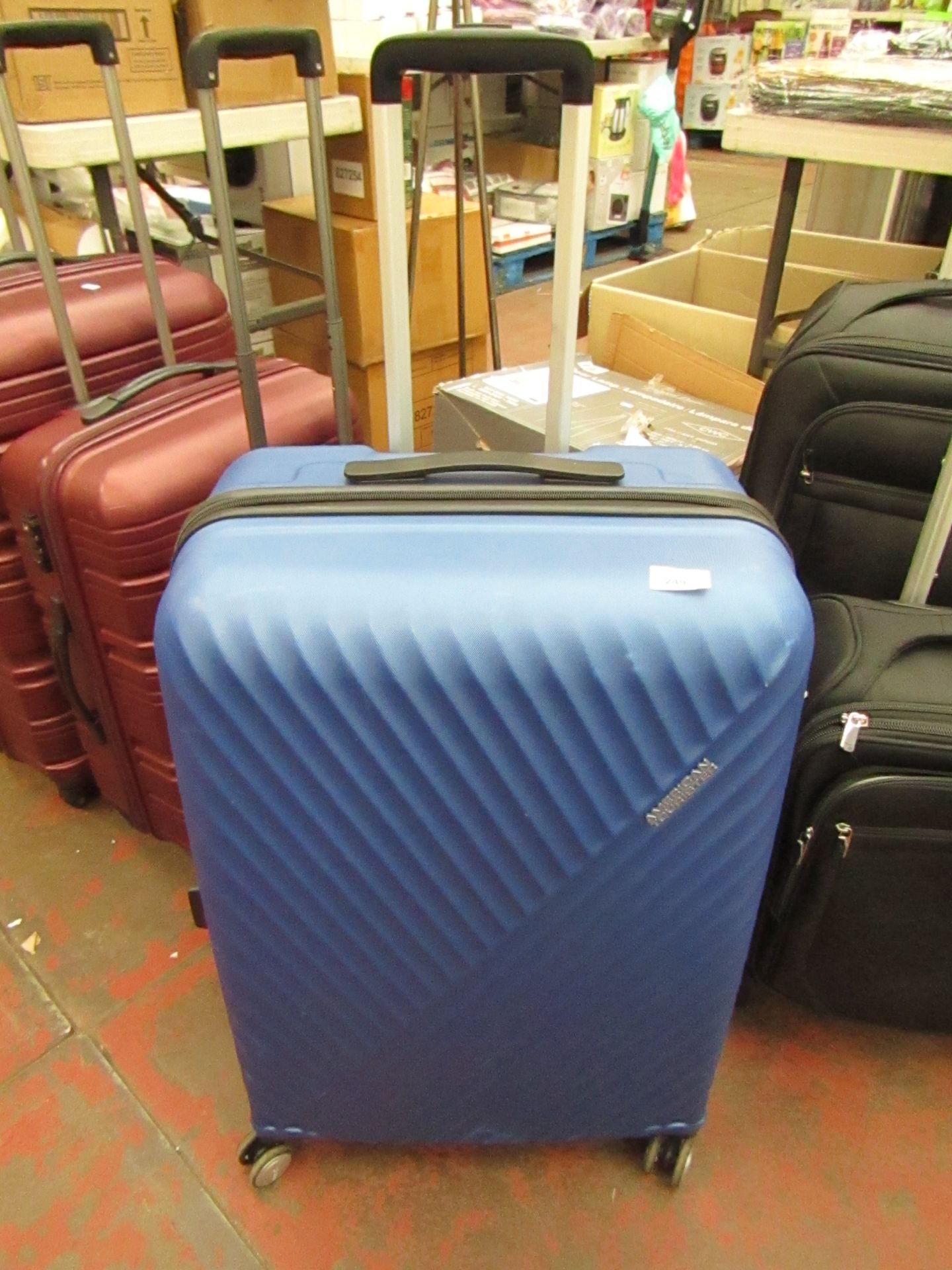 American Tourister Large Size Suitcase. Has a couple of little scuffs but nothing major.