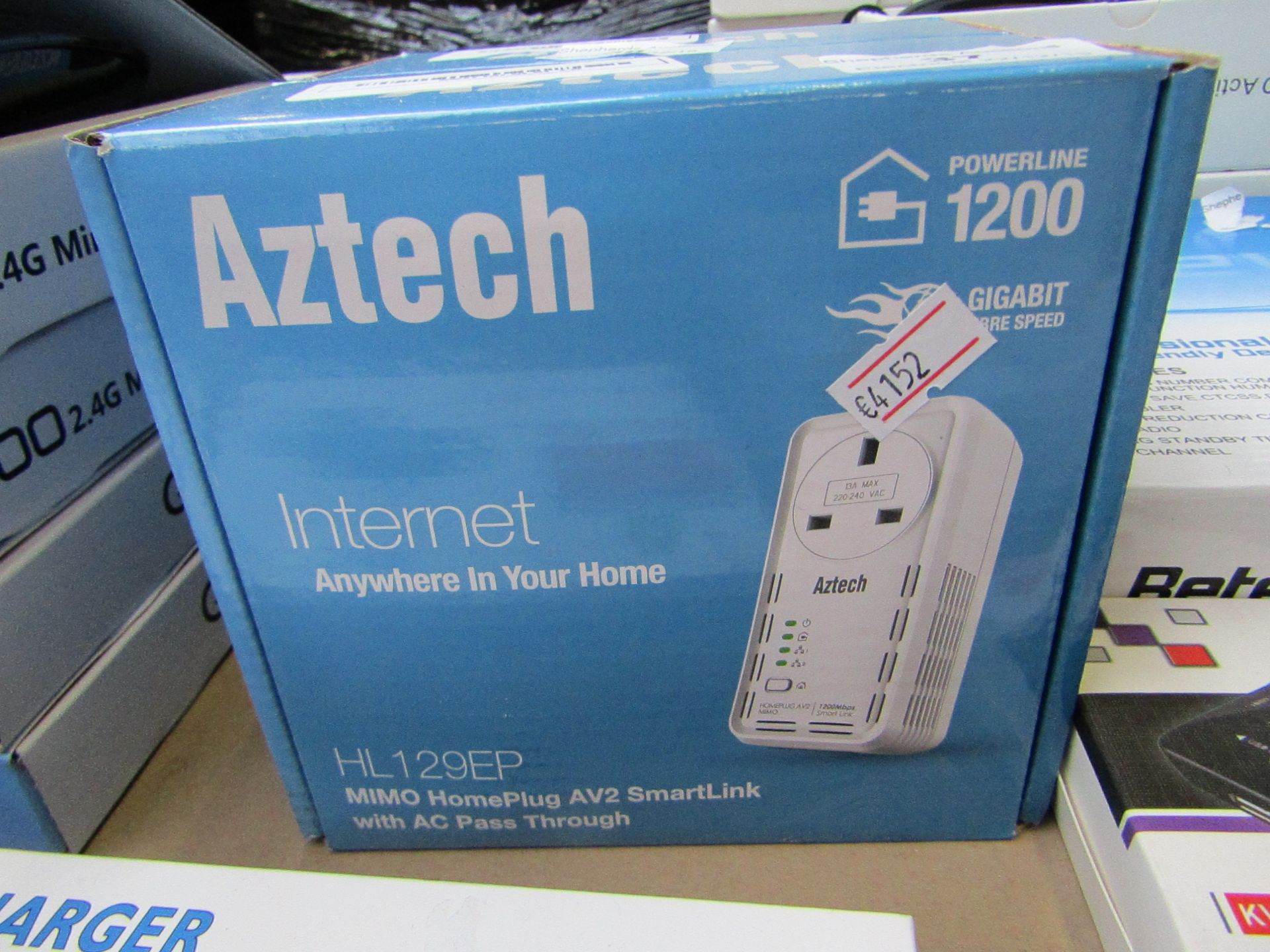Aztech - HL129EP - MIMO Homeplug AV2 Smartlink with AC paa through, unchecked and boxed.