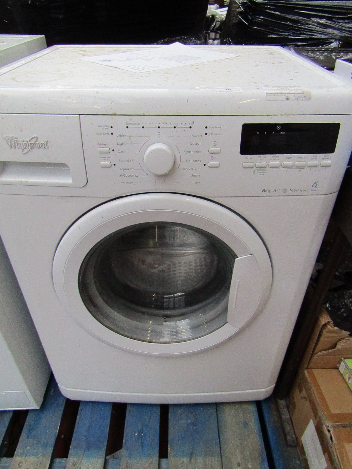 Whirlpool 6th Sense Colours 8Kg washing machine, powers on and spins.