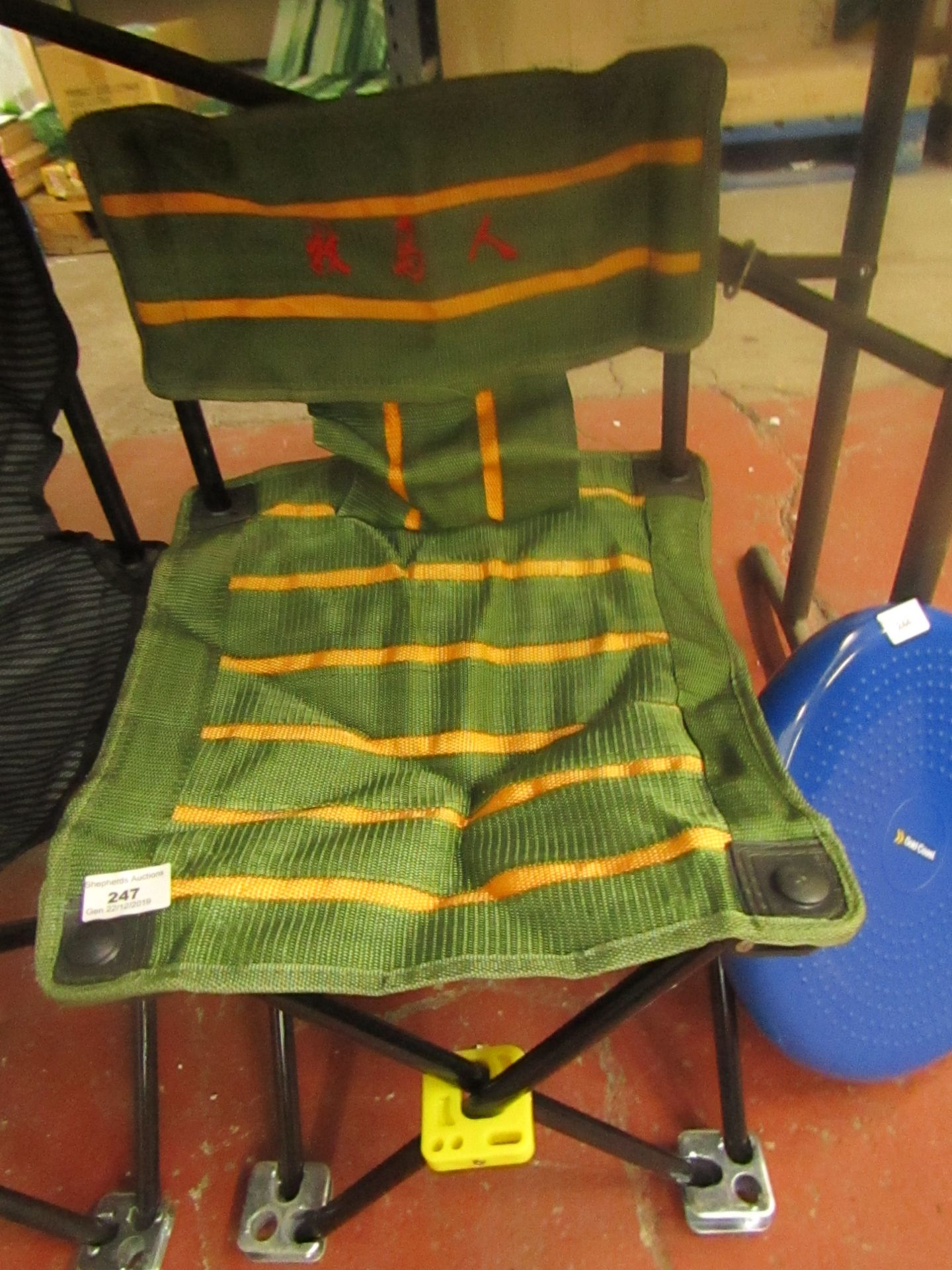 Childs fold away camping chair, looks unused