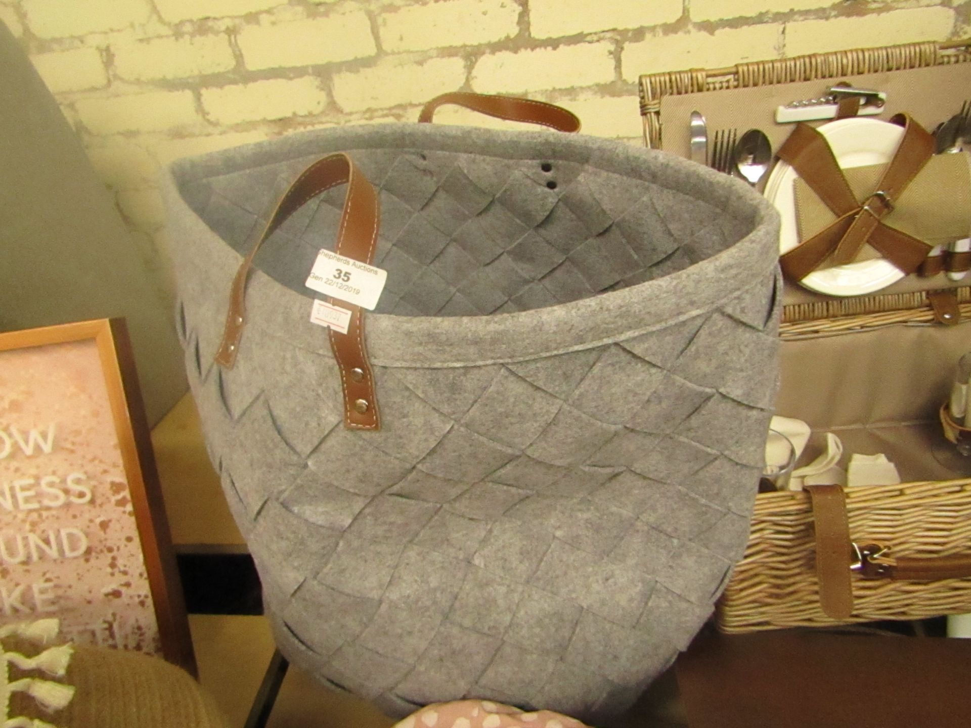 Large grey woven fabric carry bag - see image for design.