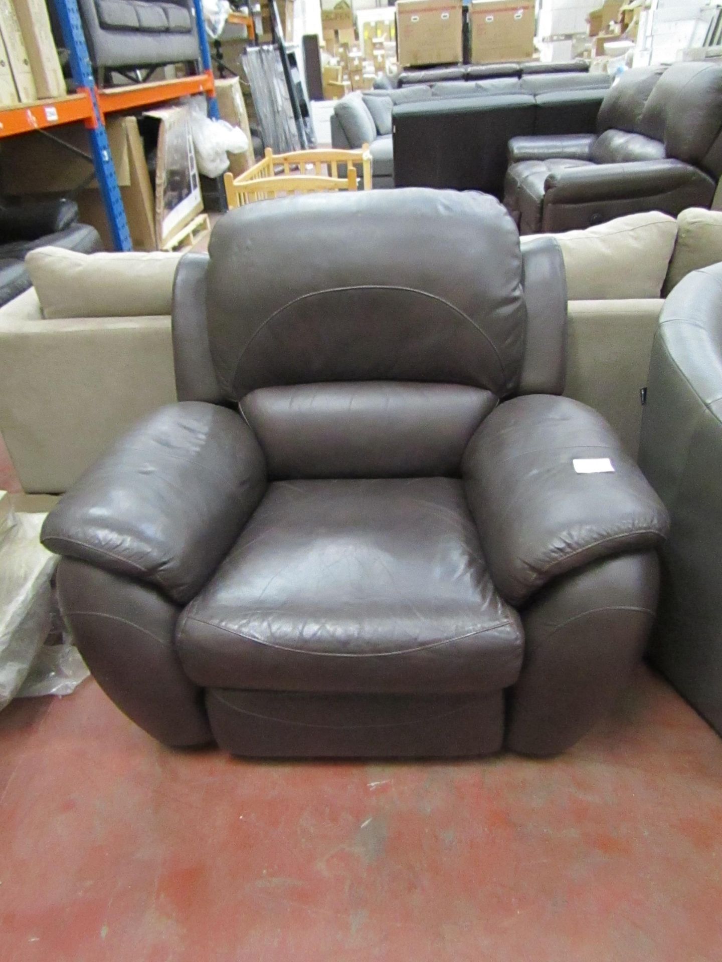 La Z Boy Brown leather manual reclining sofa, tested working but has damage to the seat