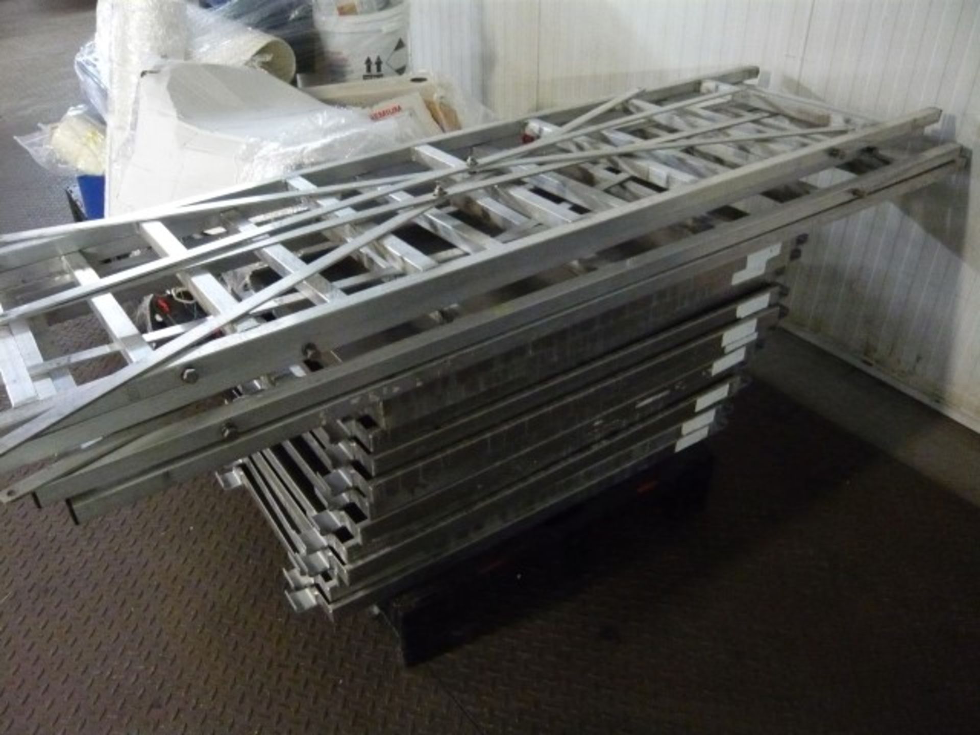Quantity of aluminium shelving to include (4) uprights and (12) shelves