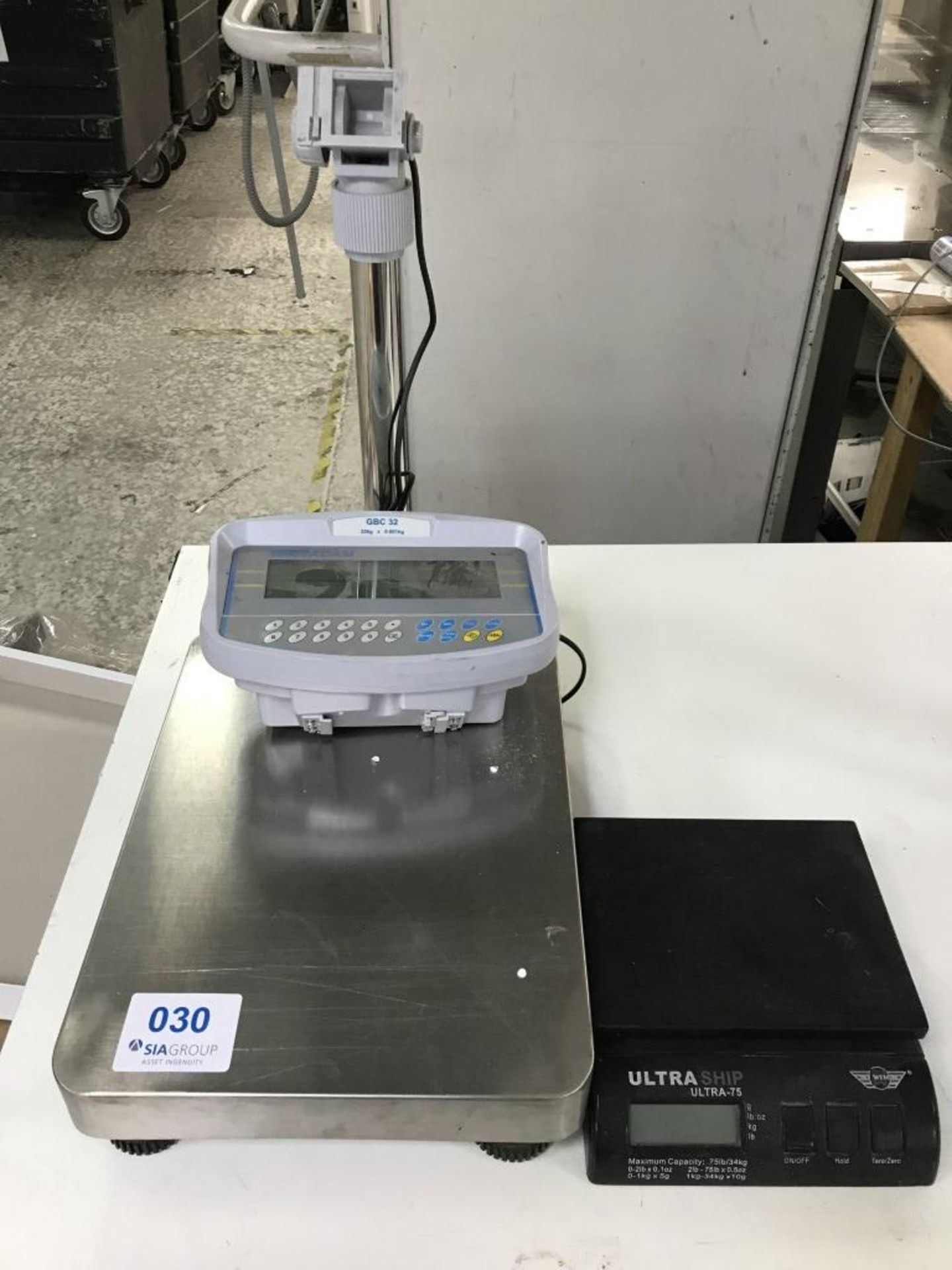 GBC 32 32kg x 0.001kg digital weighing scale and an Ultraship Ultra 75 weighing scale