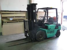 TCM Model FG25N gas powered ride on fork lift truck