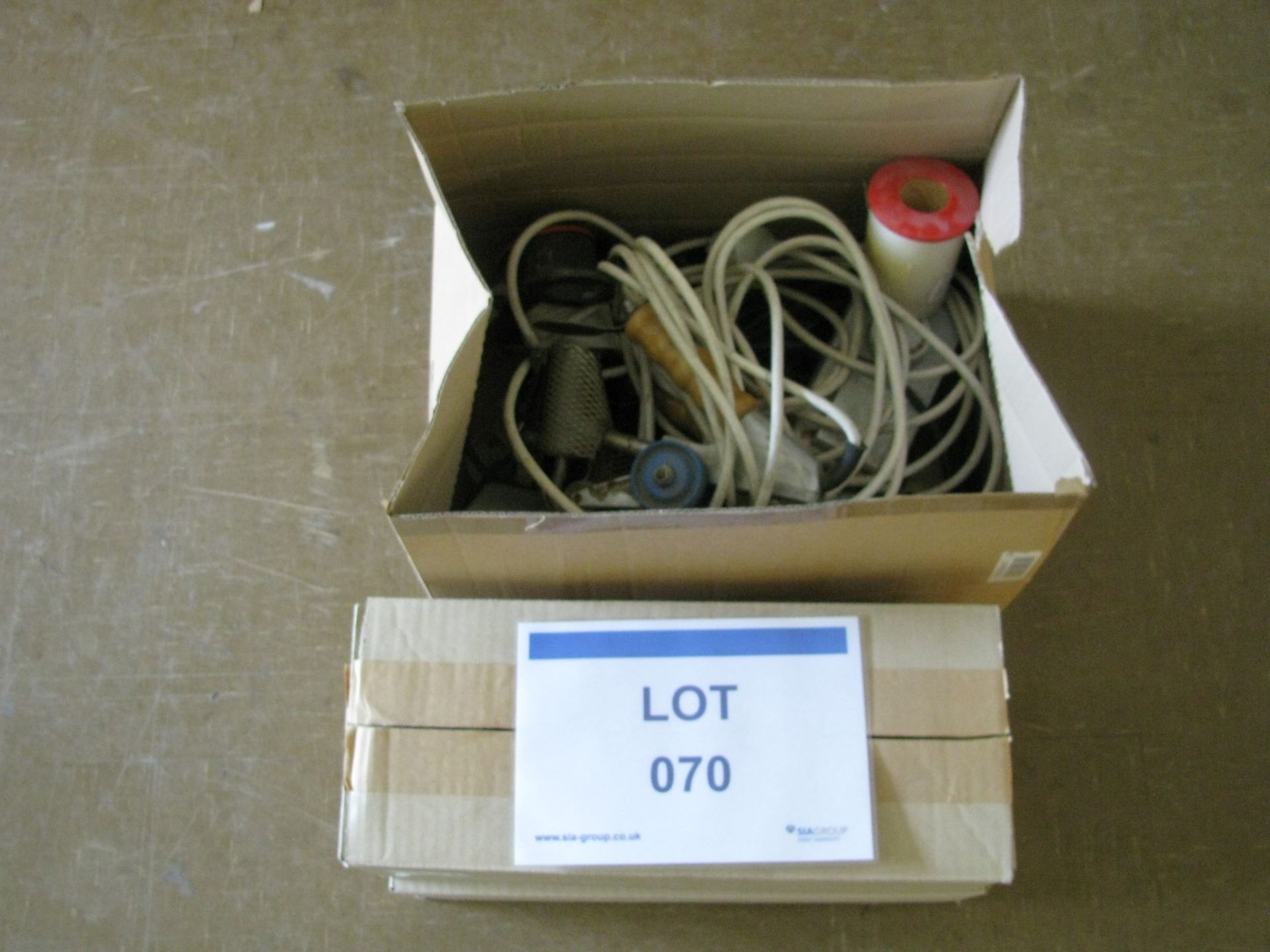 Box containing (3) Manual stitchers and spare parts