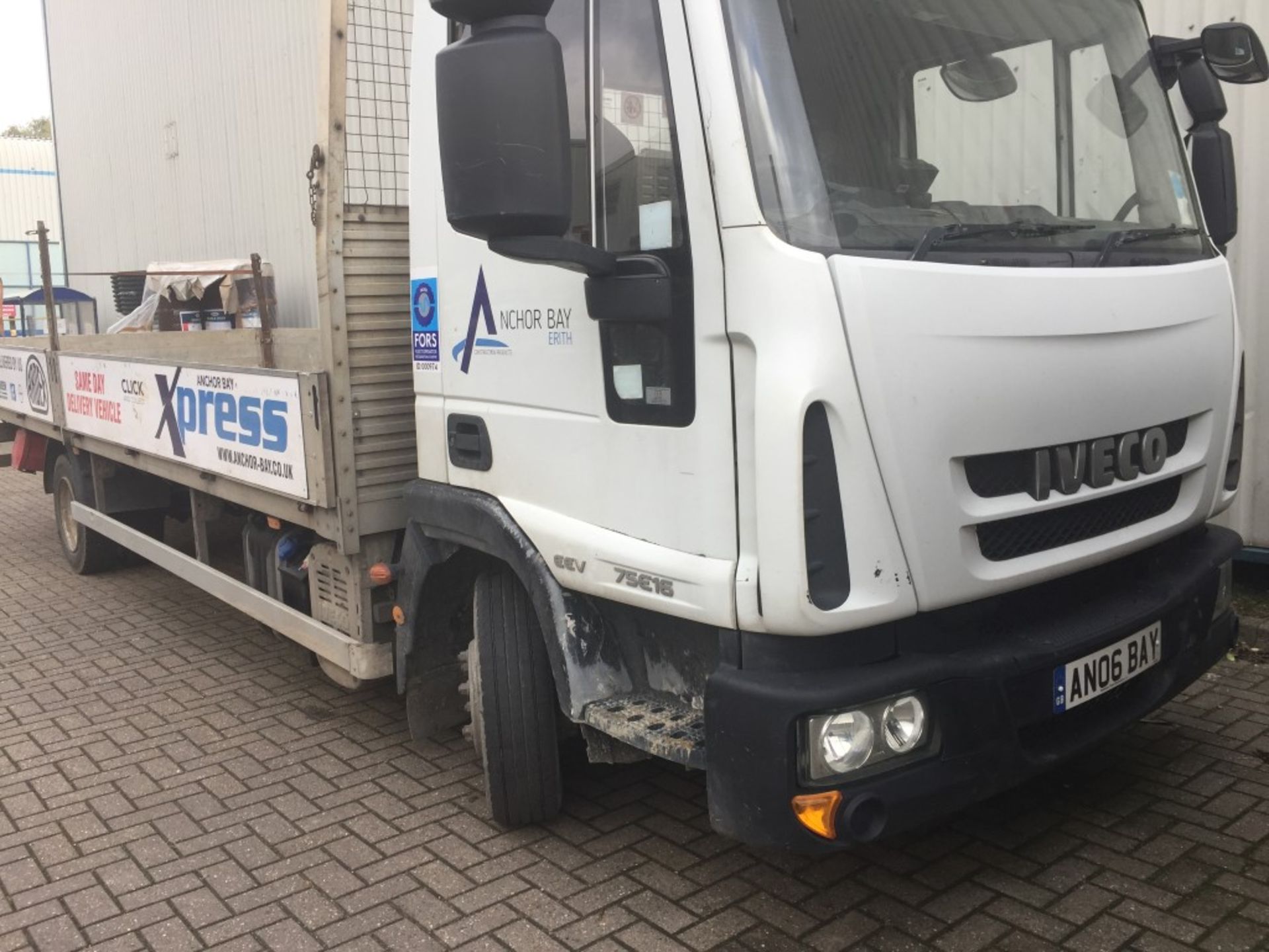 IVECO Eurocargo 75e16 day cab 7.5t automatic dropside truck, Registration No. AN06 BAY