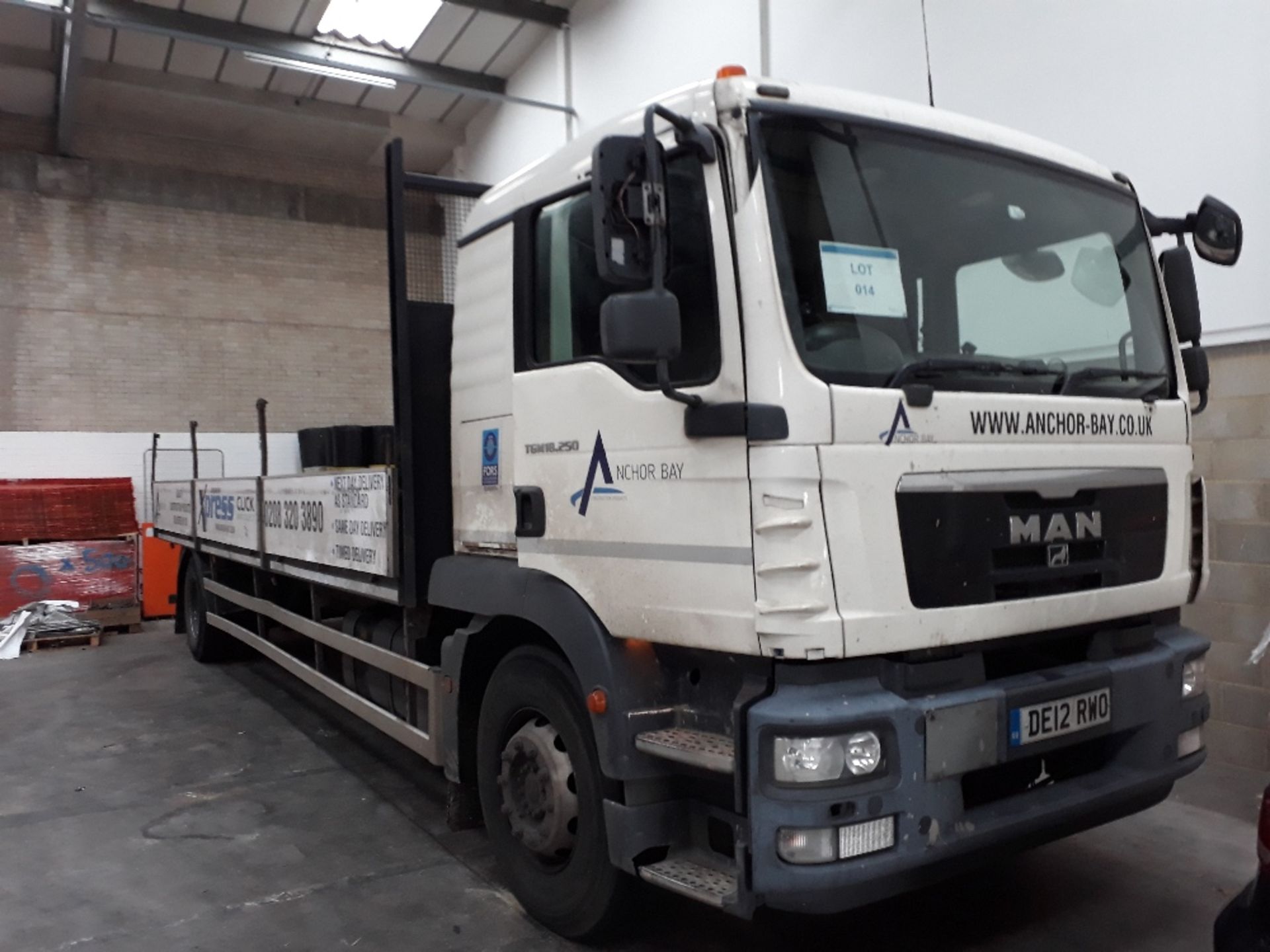 MAN TGM 18.250 sleeper cab 18t dropside truck, Registration No. DE12 RWO - Image 2 of 9