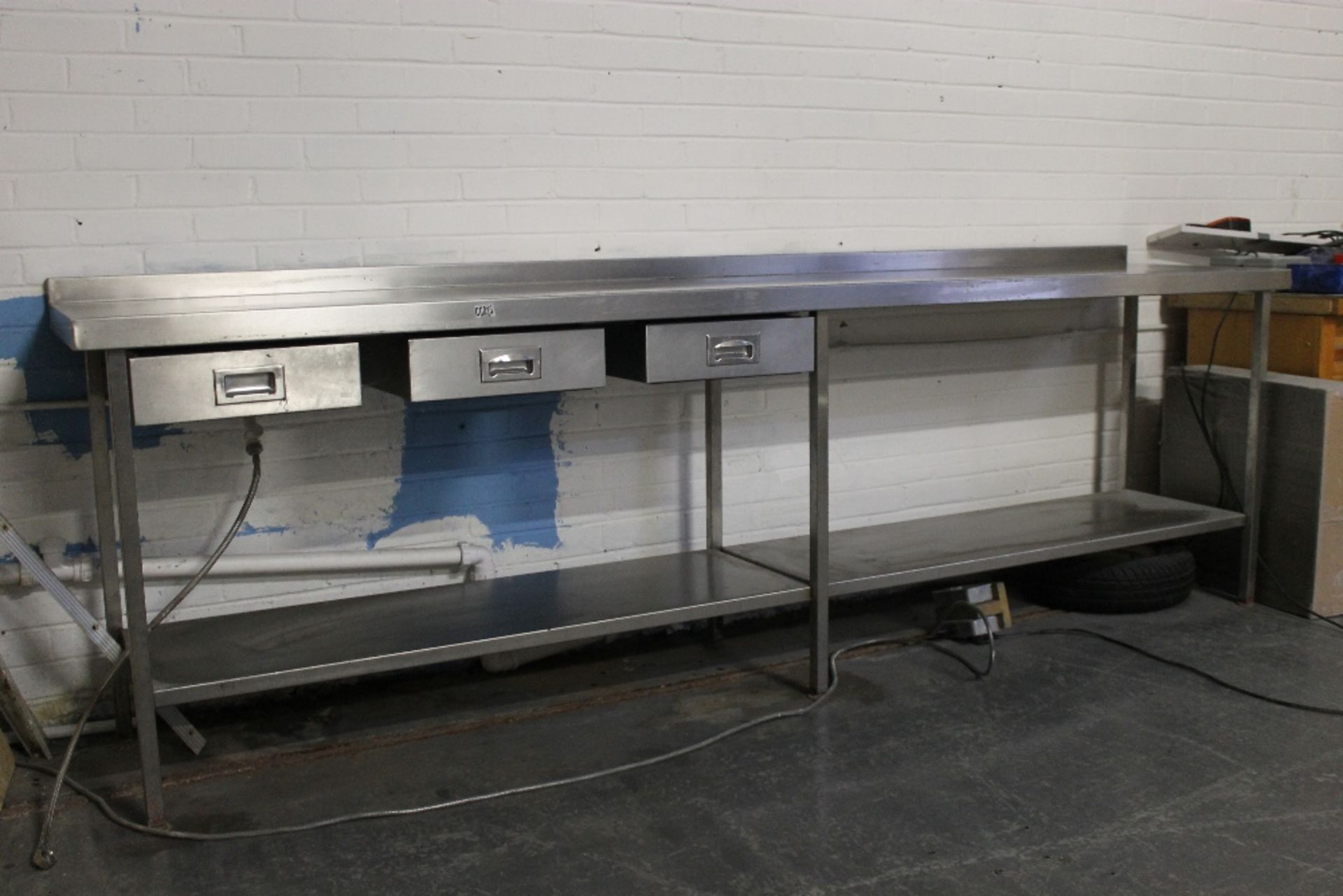 Stainless Steel Table with 3 Drawers + Under Shelf – Drawers missing bottoms W290cmxH95cmxD62cm