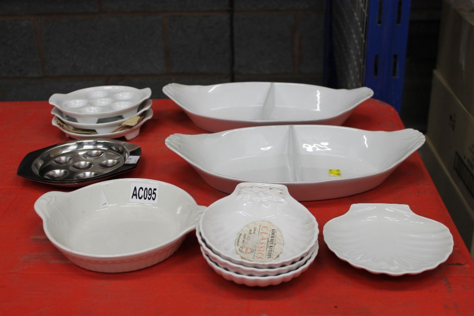 Mixed Crockery Lot to include:Serving DishesSmall Casserole Dish3 x Scallop DishesCeramic Snail