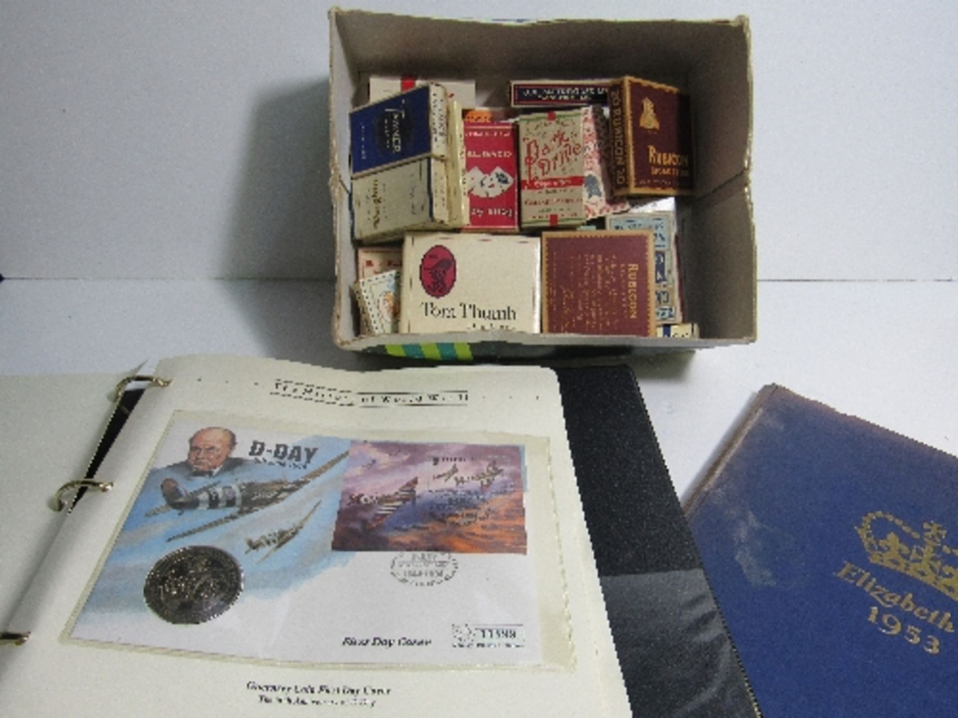 Elizabeth R, 1953 commemorative album, box containing old cigarette packets, album of First Day