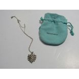 Tiffany & Co olive leaf pendant & necklace. Estimate £40-50.